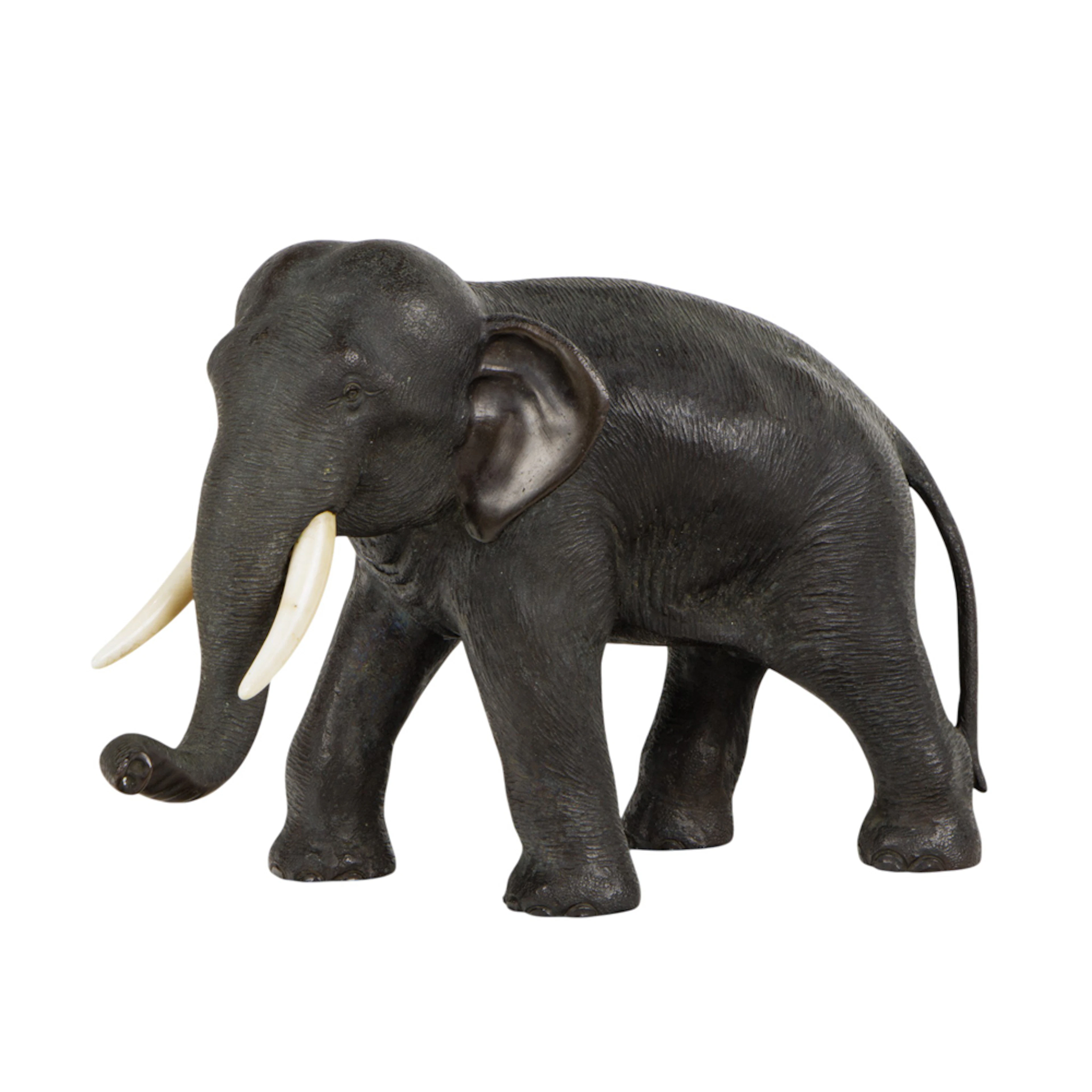 A Japanese bronze elephant figure