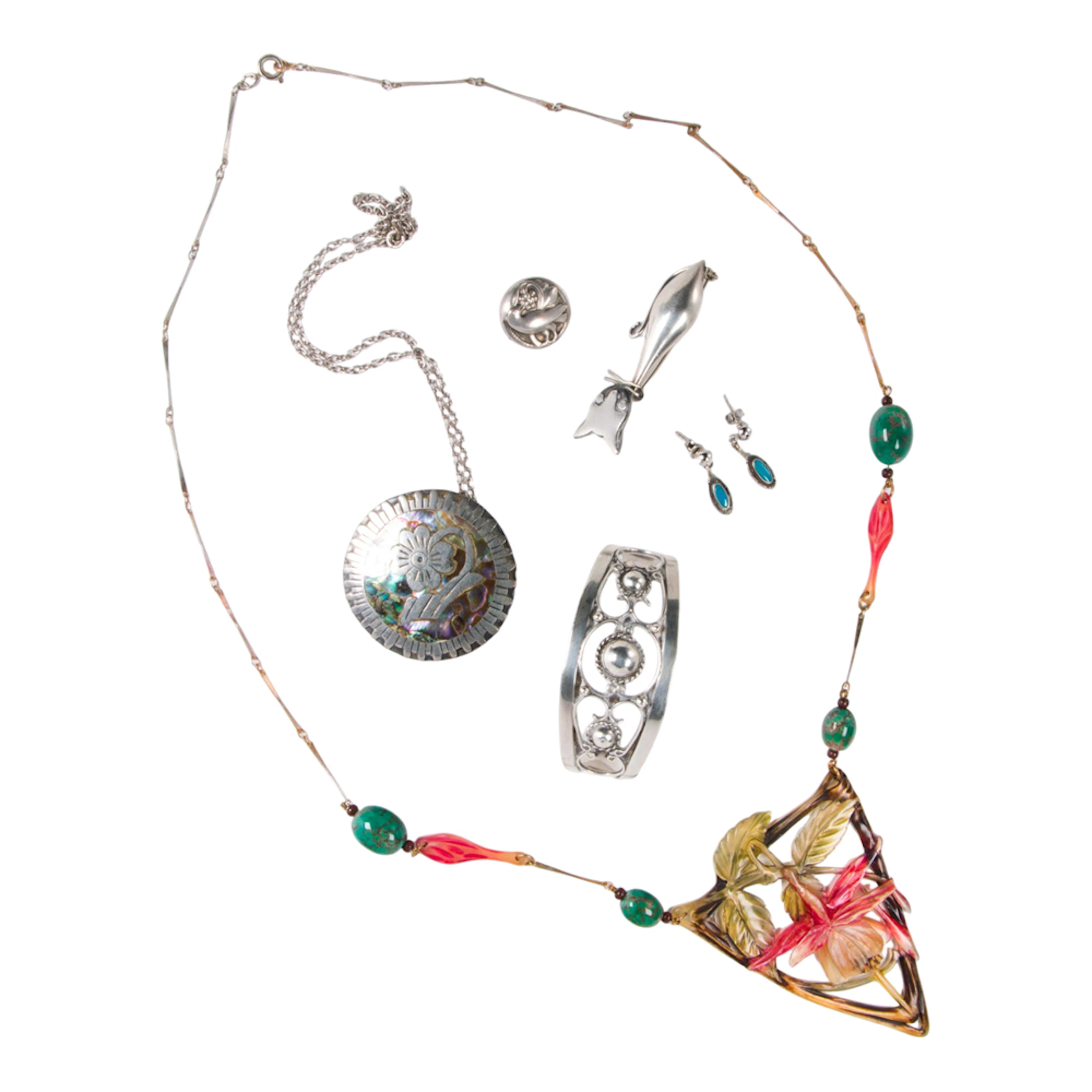 A group of silver jewelry including Georg Jensen and Taxco