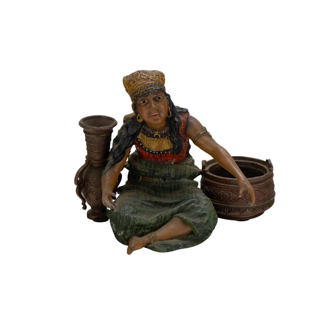 A Continental cold painted metal figural smoking stand