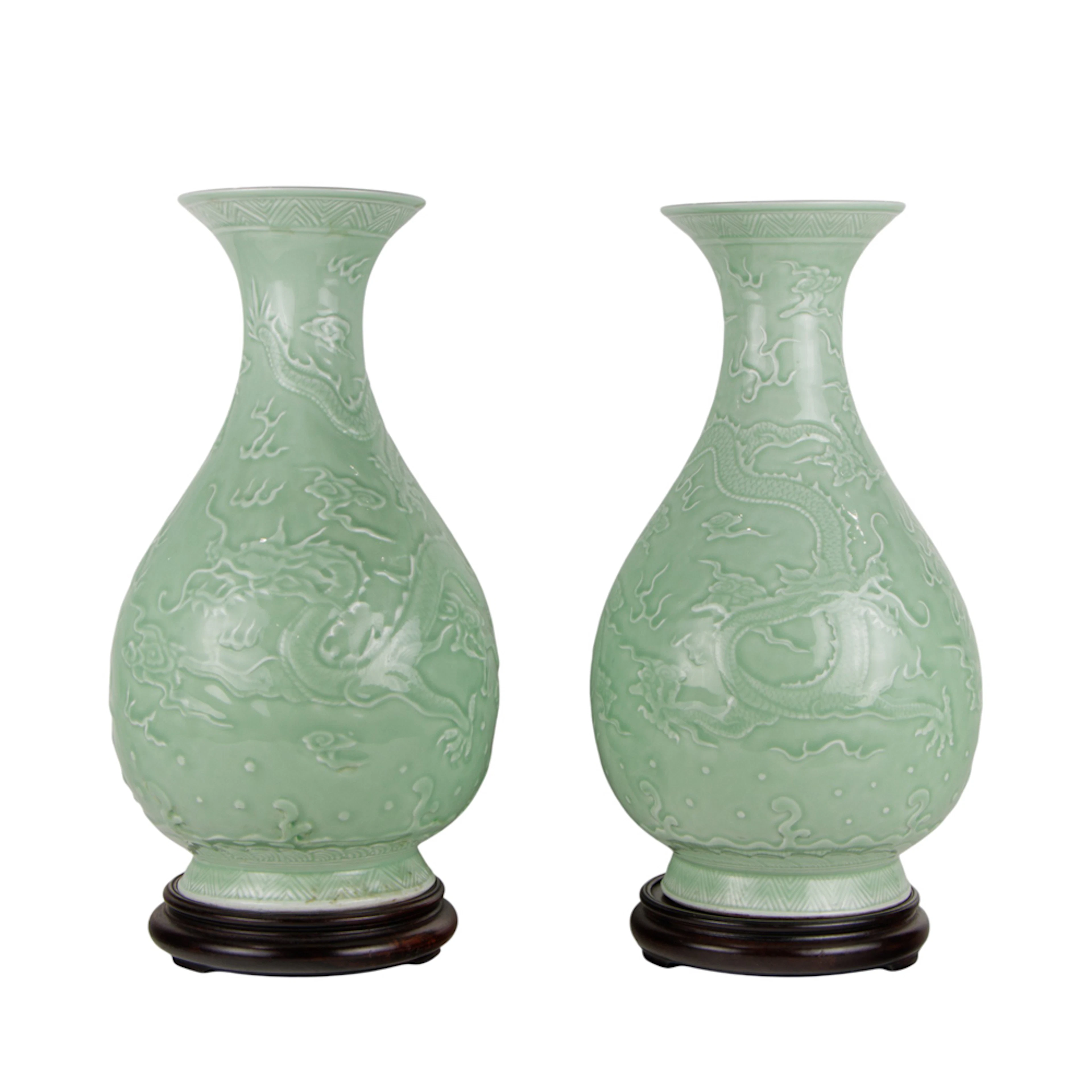 (lot of 2) Chinese celadon glazed and carved 'dragon' vases
