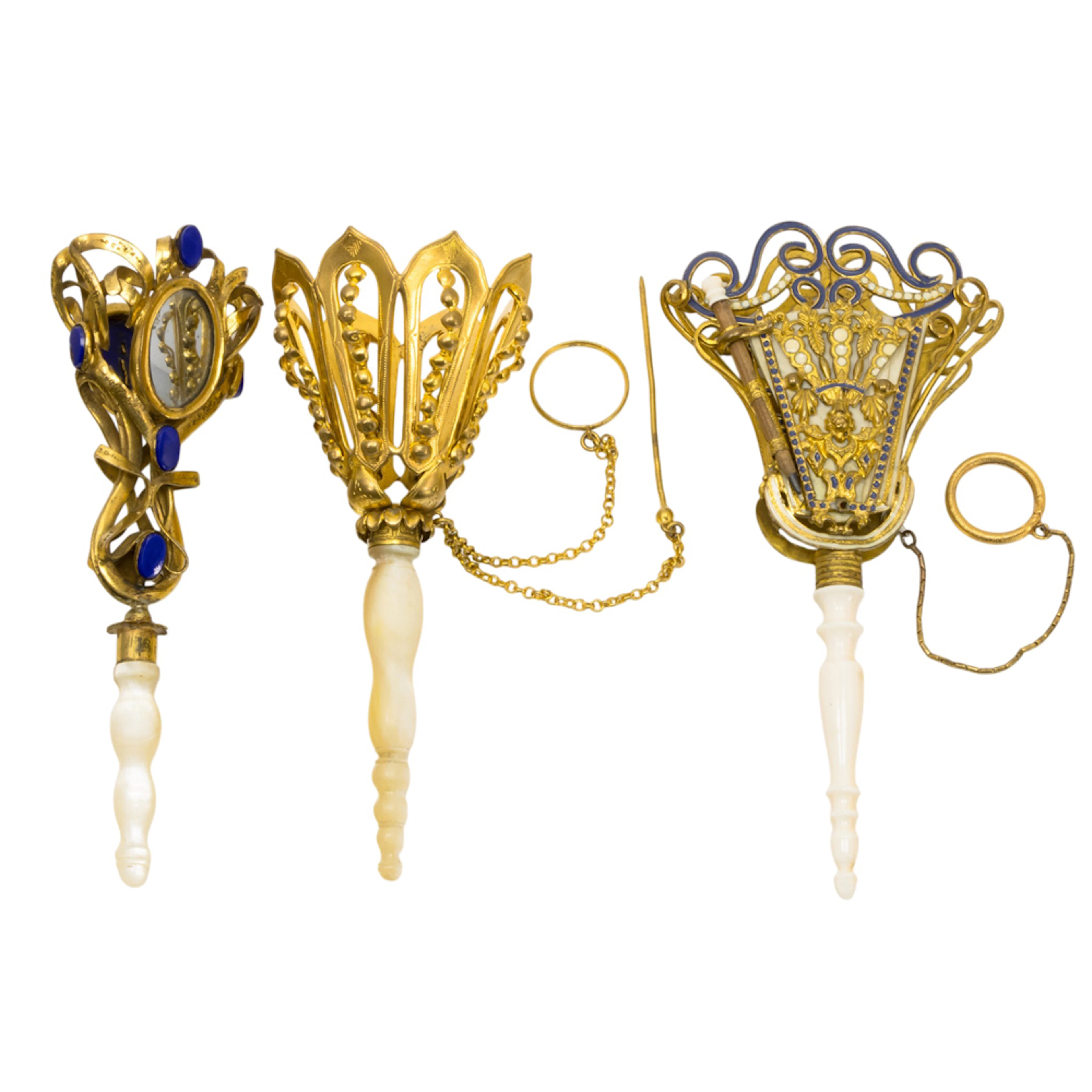 Three French or English gilt metal posy holders or tussie mussies