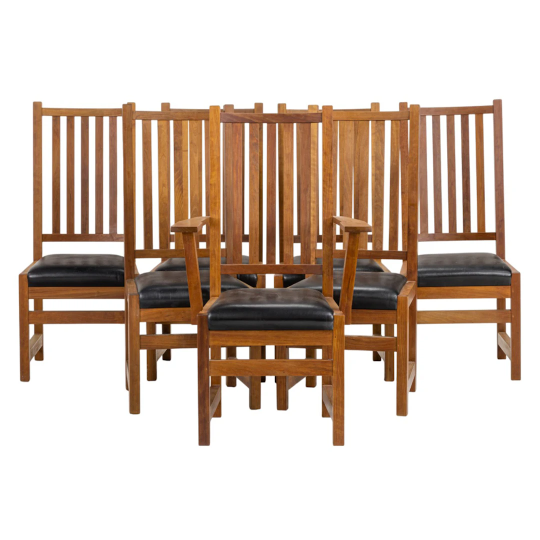A set of seven Thomas Moser tall back dining chairs