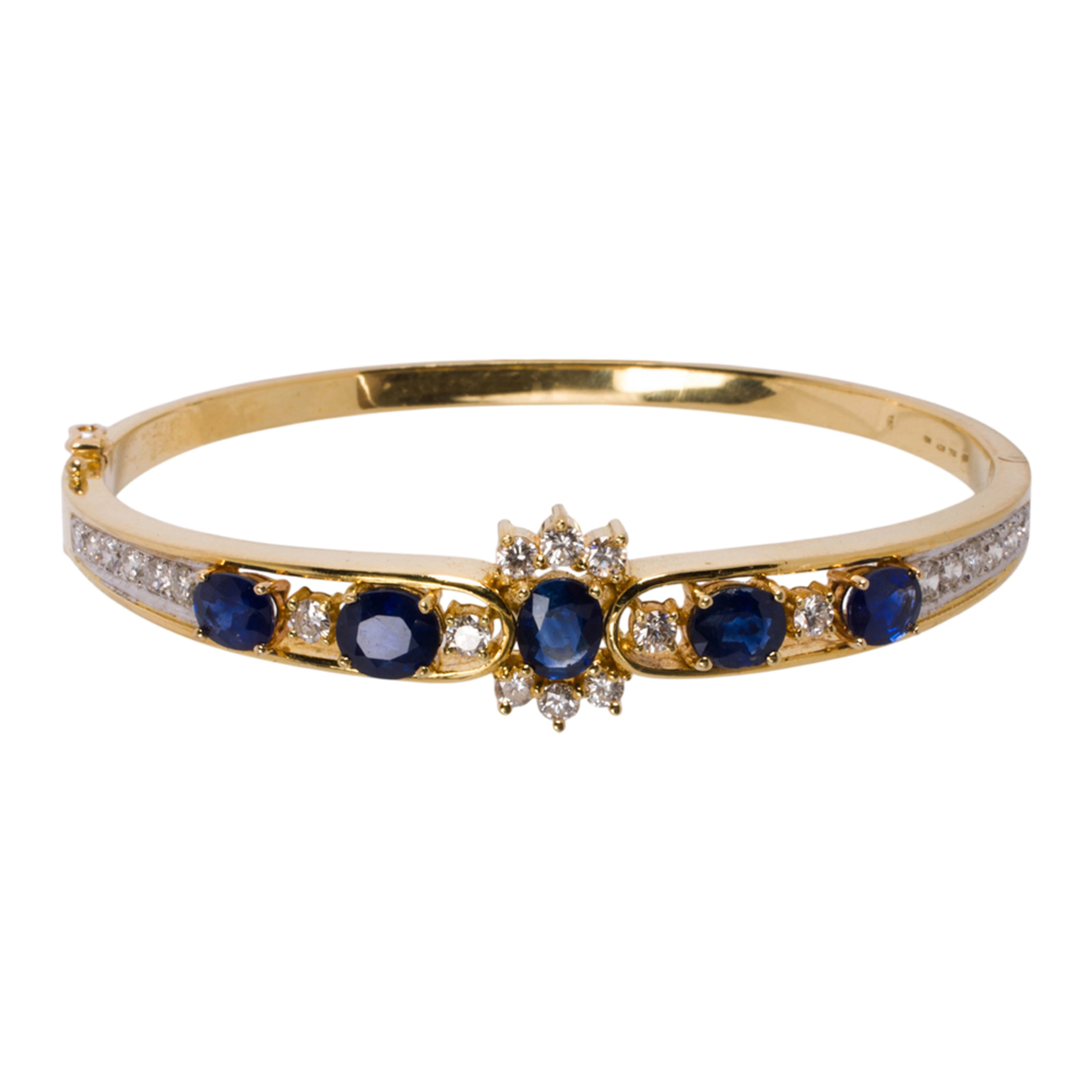 A sapphire, diamond and 18k gold bangle bracelet
