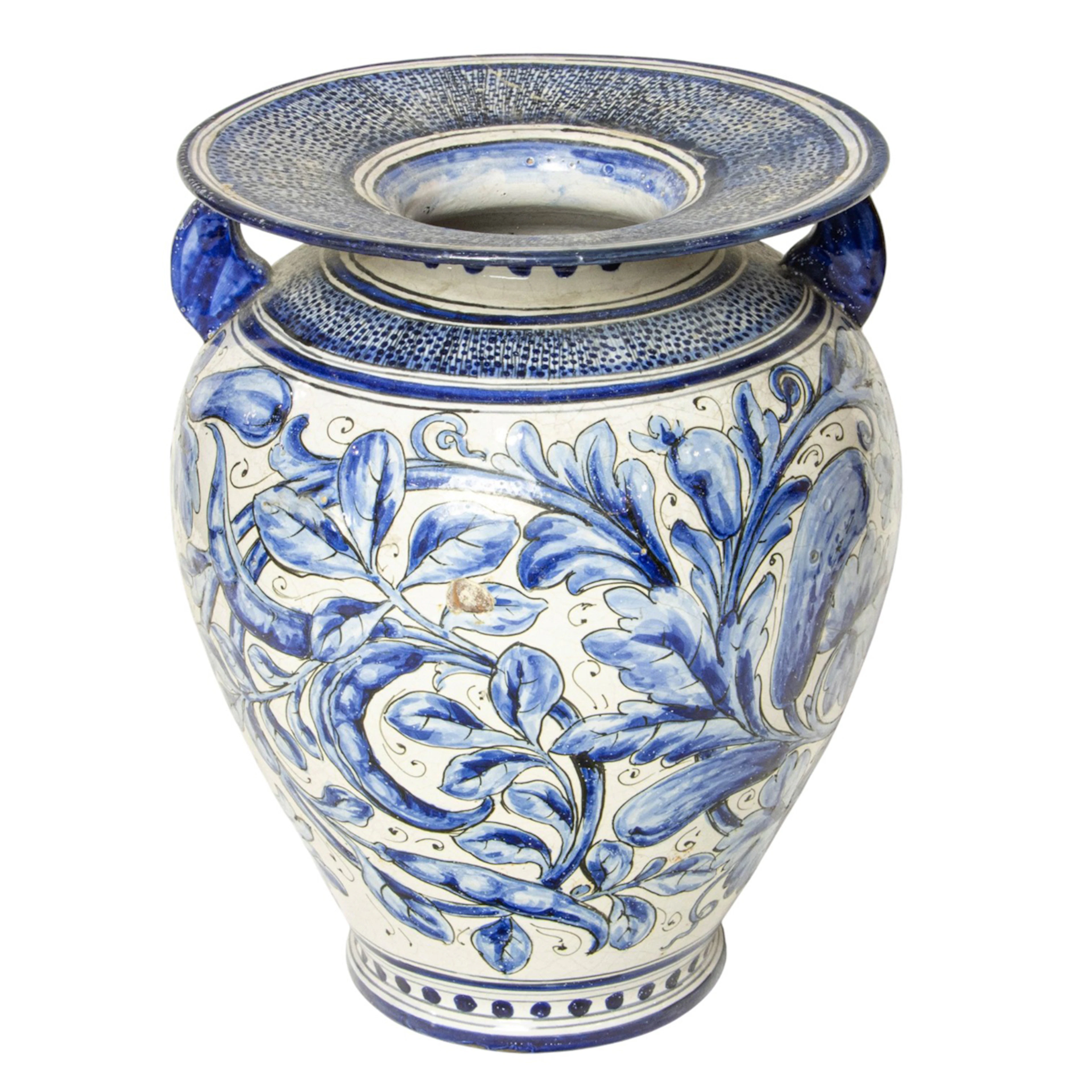 An Italian blue and white majolica urn
