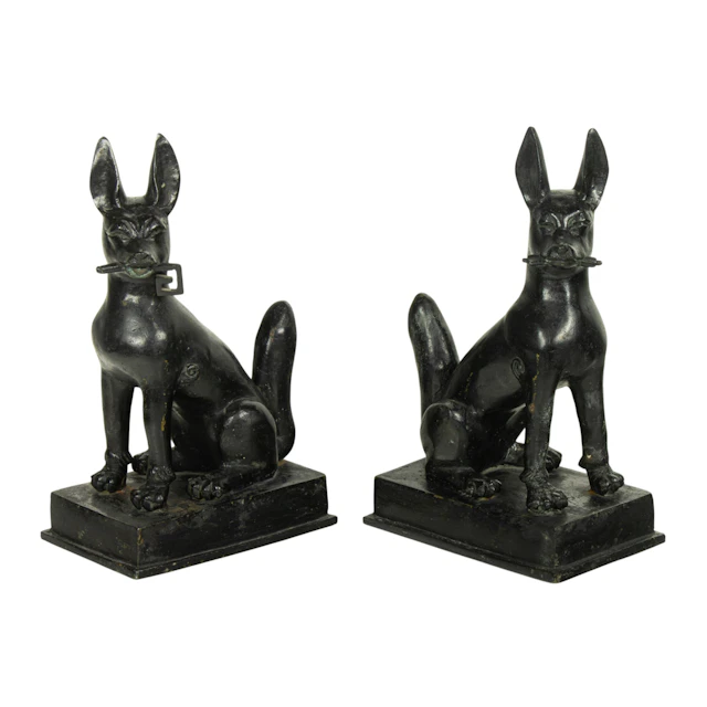 A pair of Chinese painted bronze dog figures