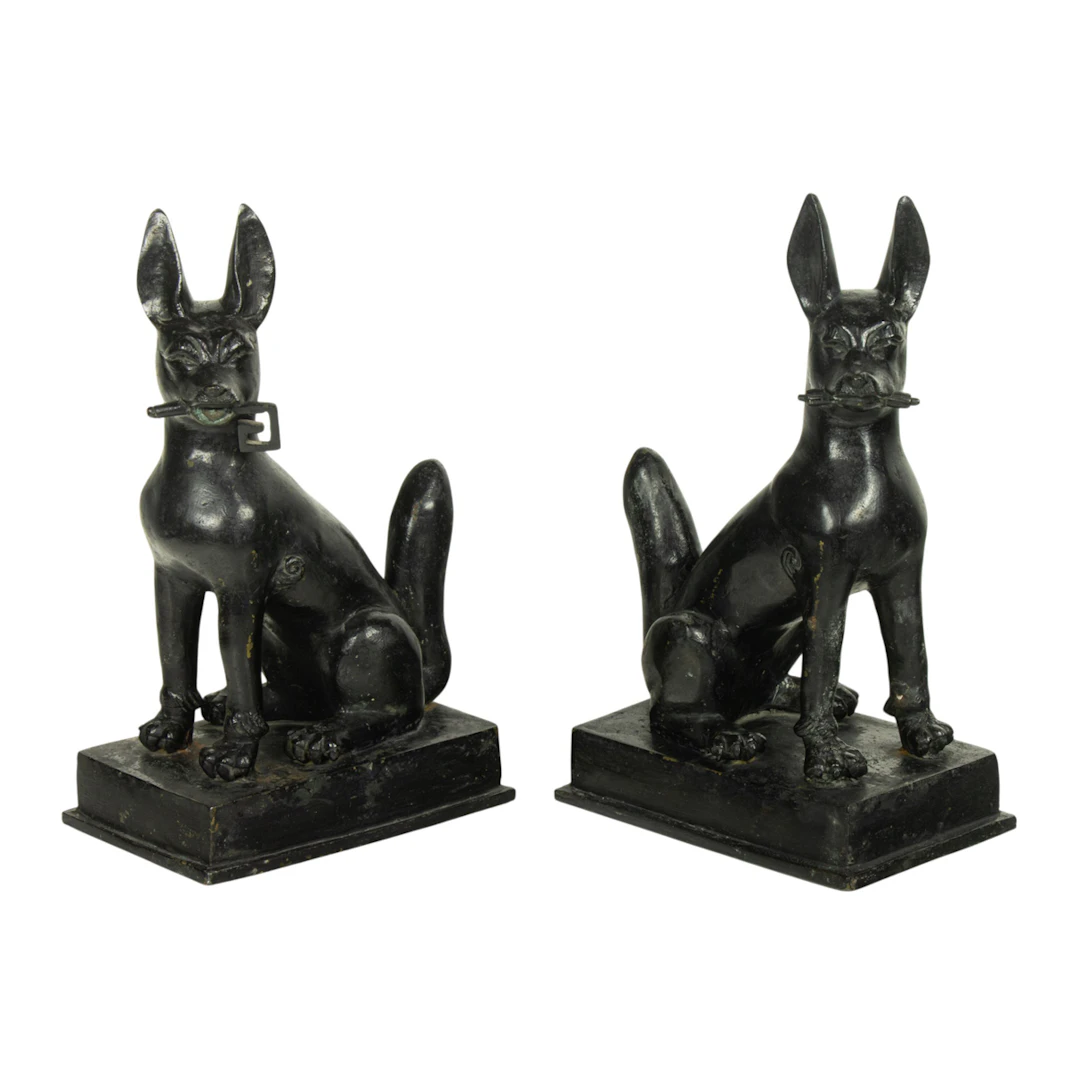 A pair of Chinese painted bronze dog figures