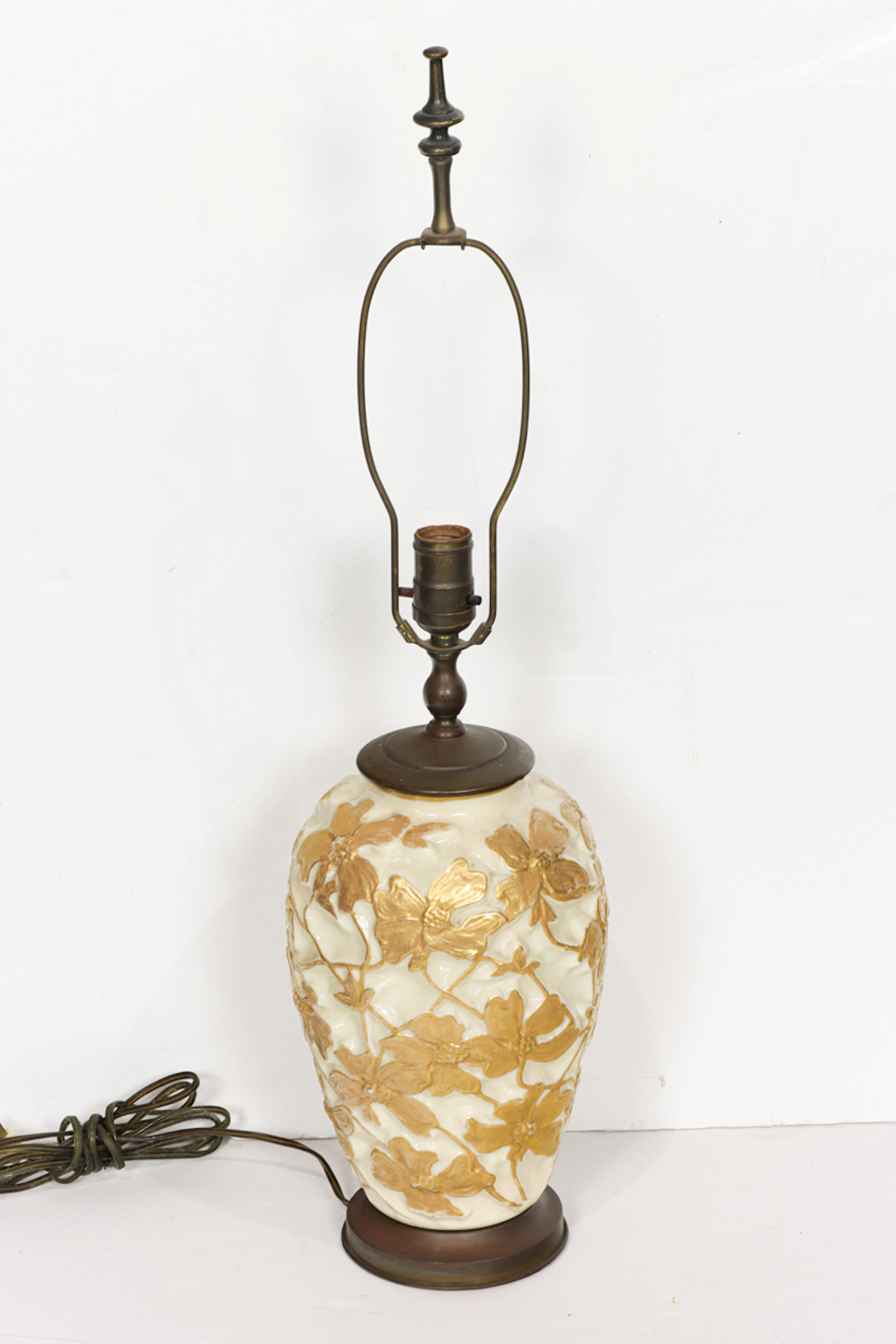 A Phoenix Art Deco gilt decorated glass table lamp decorated with