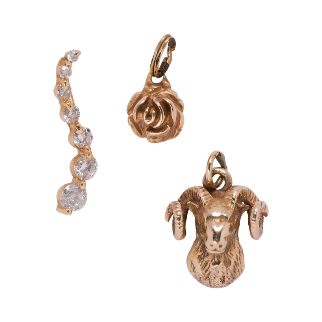 Three 14k gold pendants