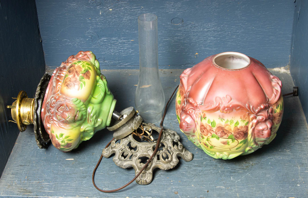 A Victorian hand-painted glass double-globe lamp