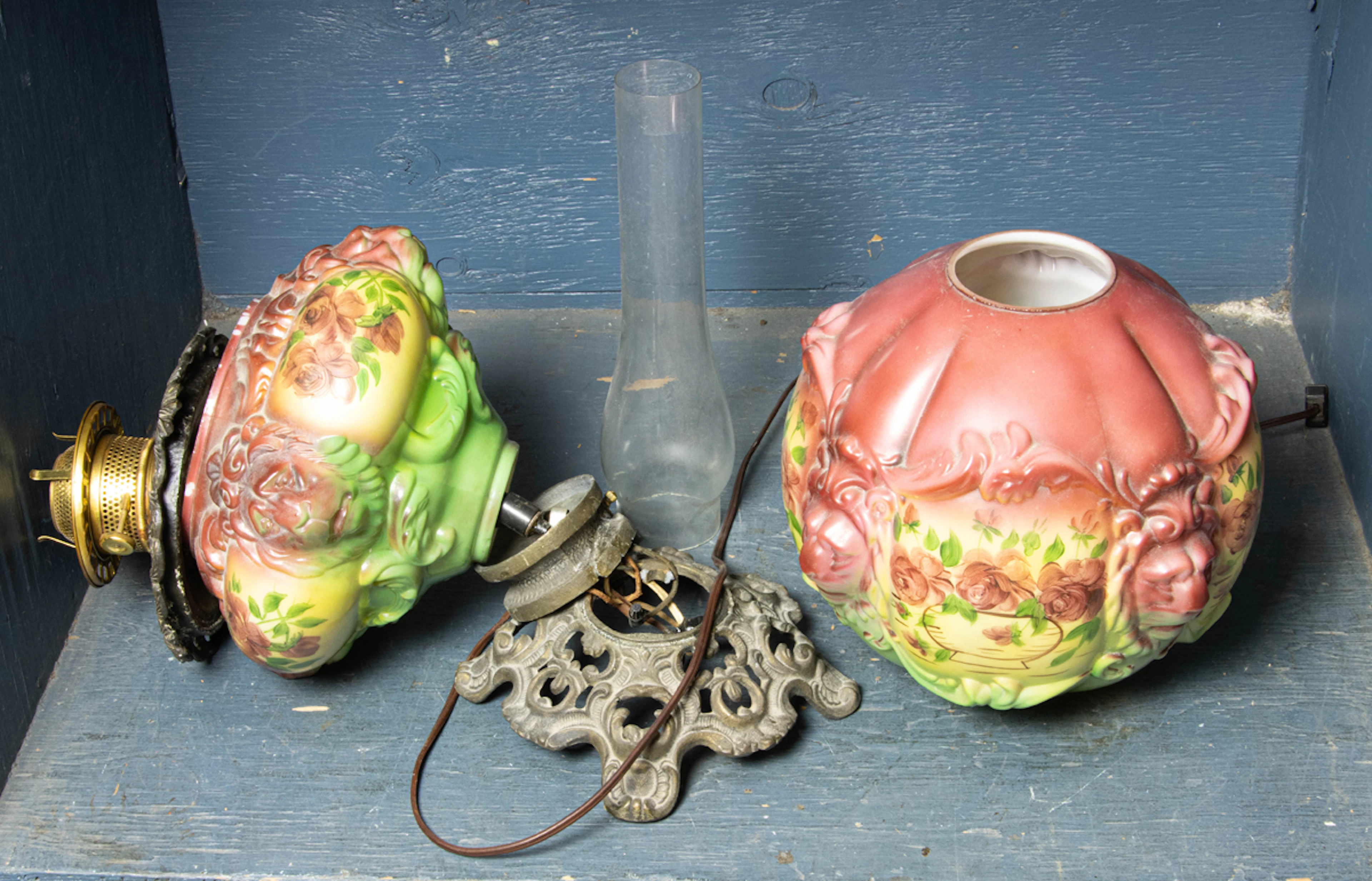 A Victorian hand-painted glass double-globe lamp