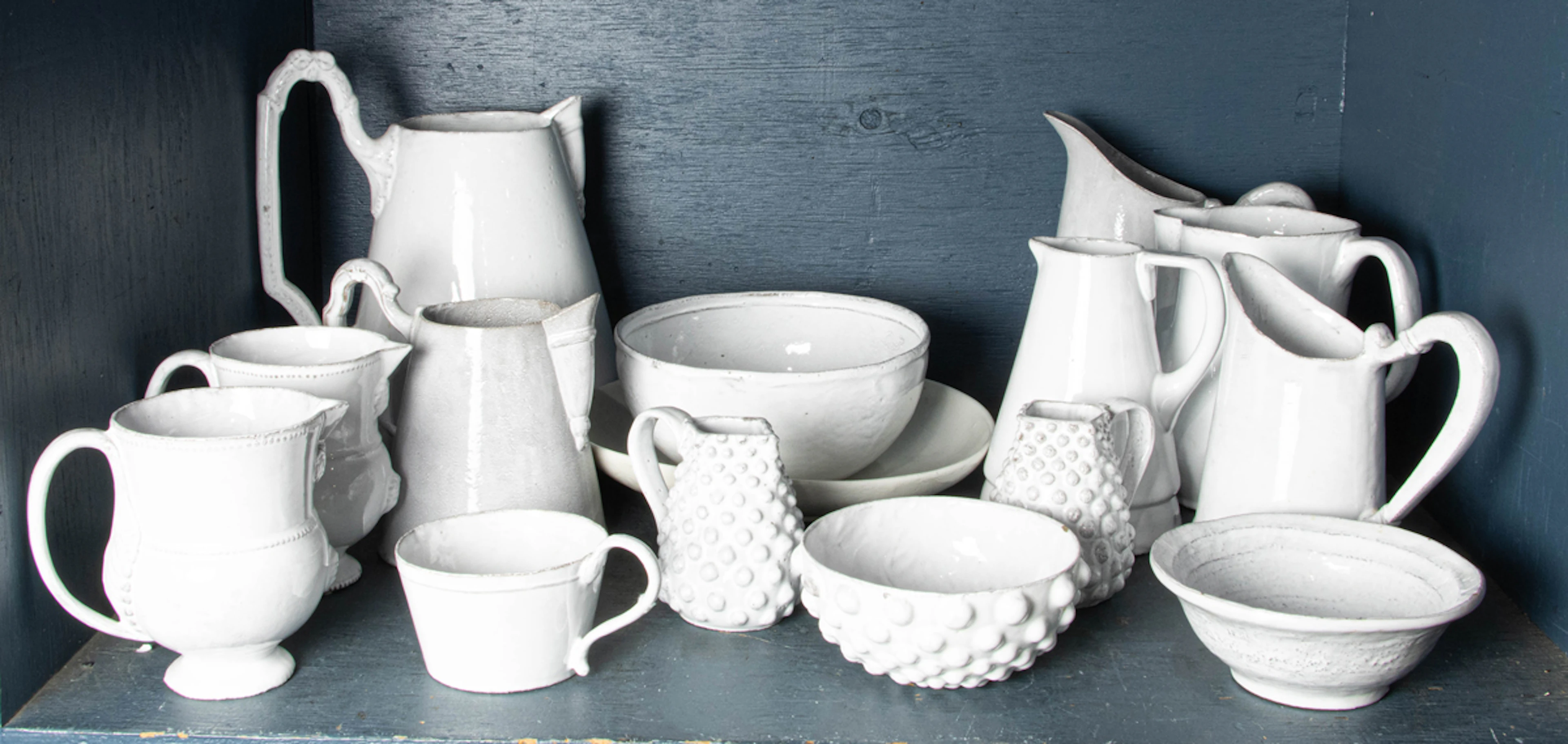 An assembled group of Astier De Villatte white glazed black pottery