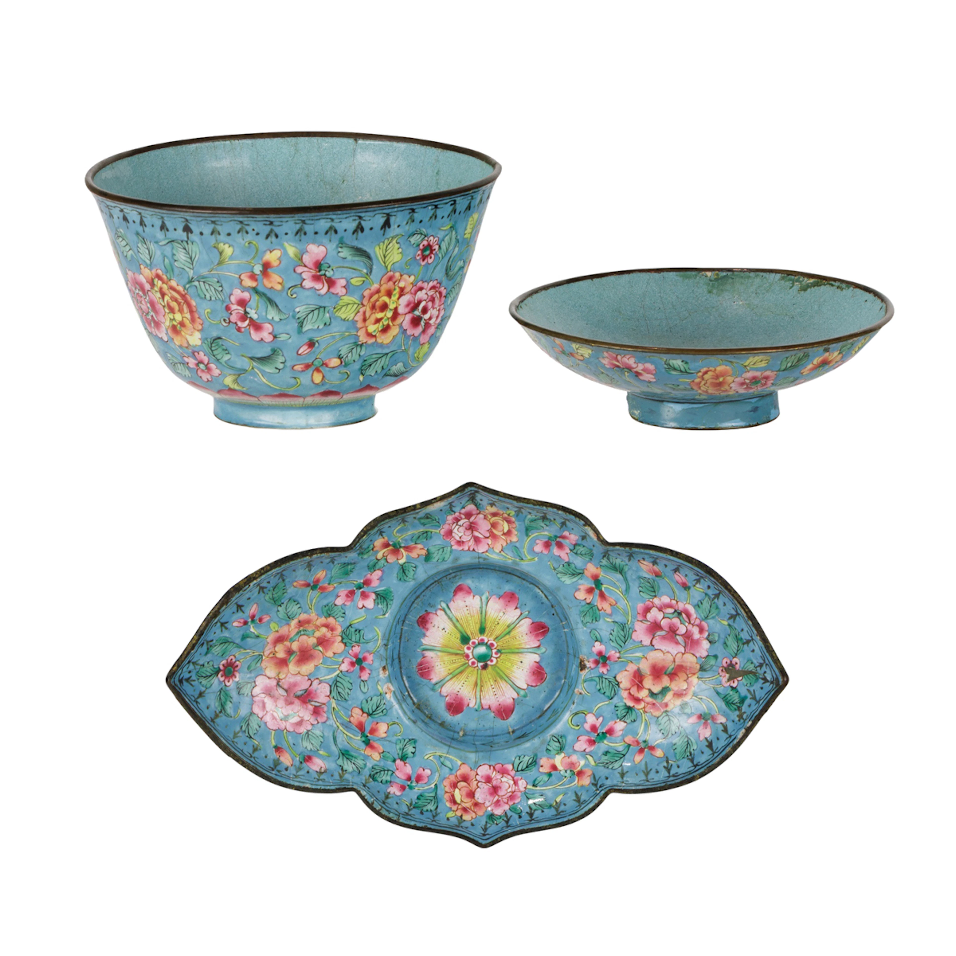 A Chinese Canton enamel lidded tea cup and stand