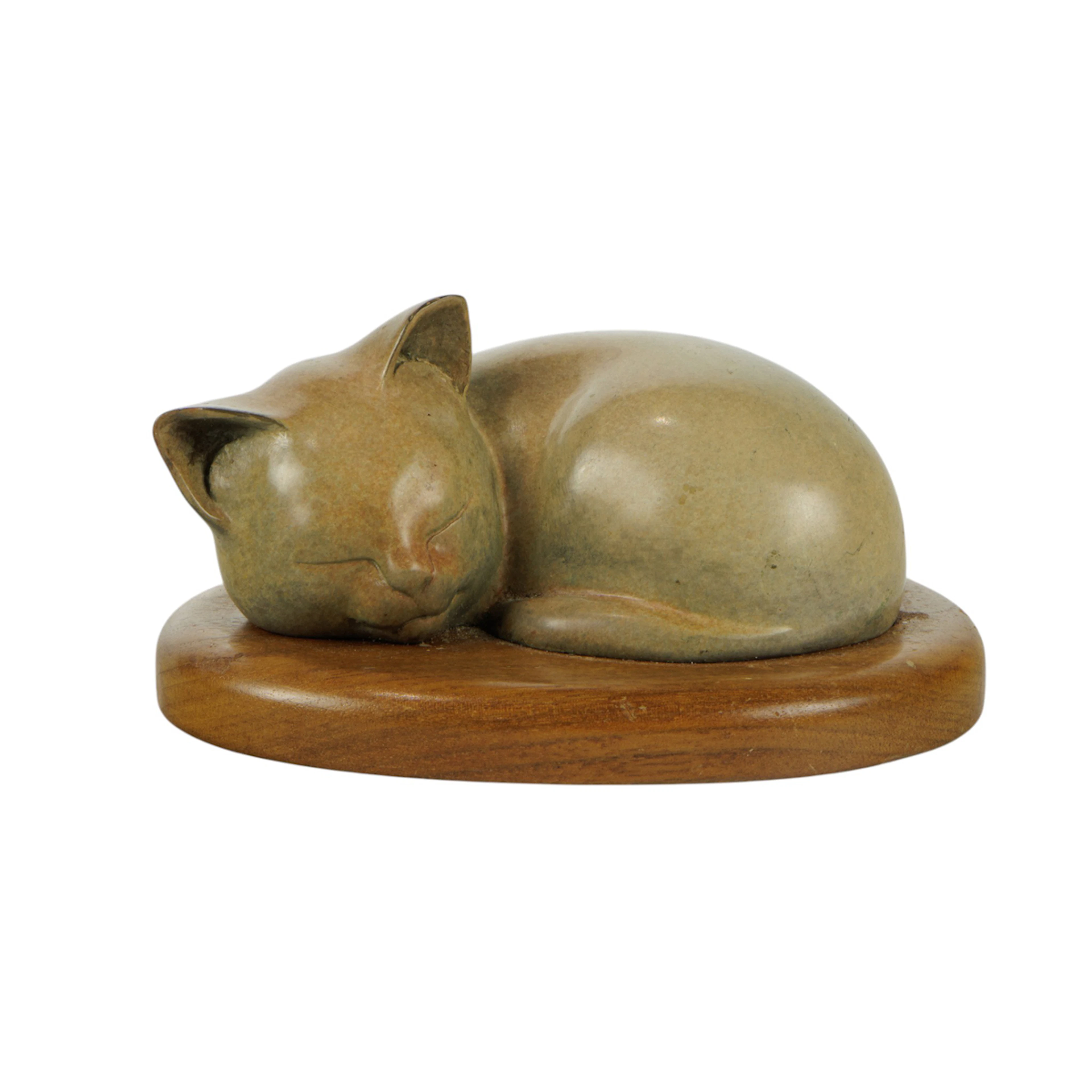 A Wah Ming Chang patinated bronze figure of a sleeping kitten