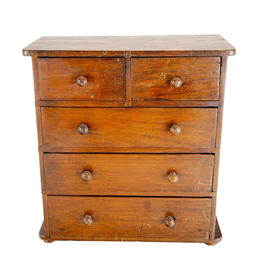 A miniature chest of drawers