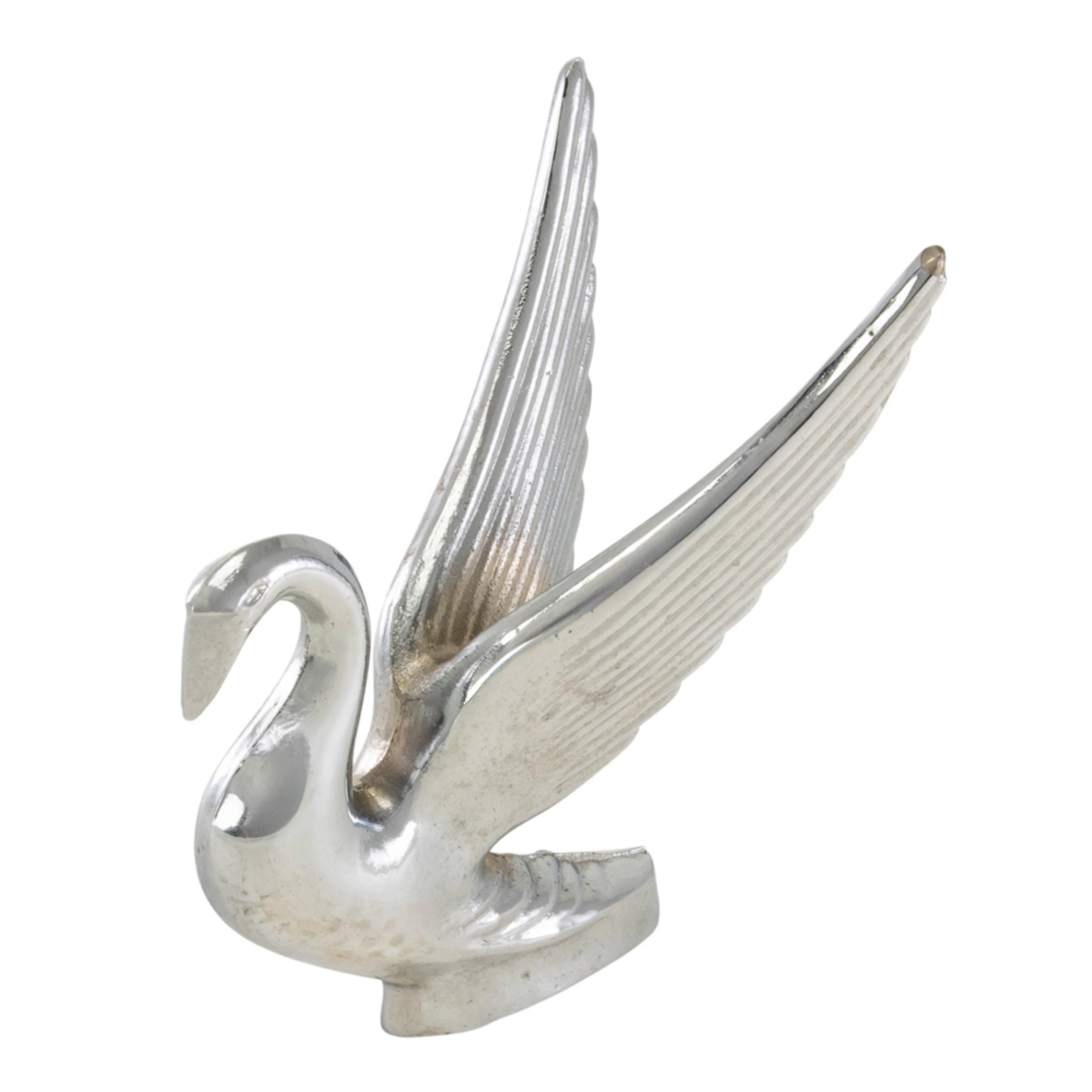 A chromed metal swan hood ornament