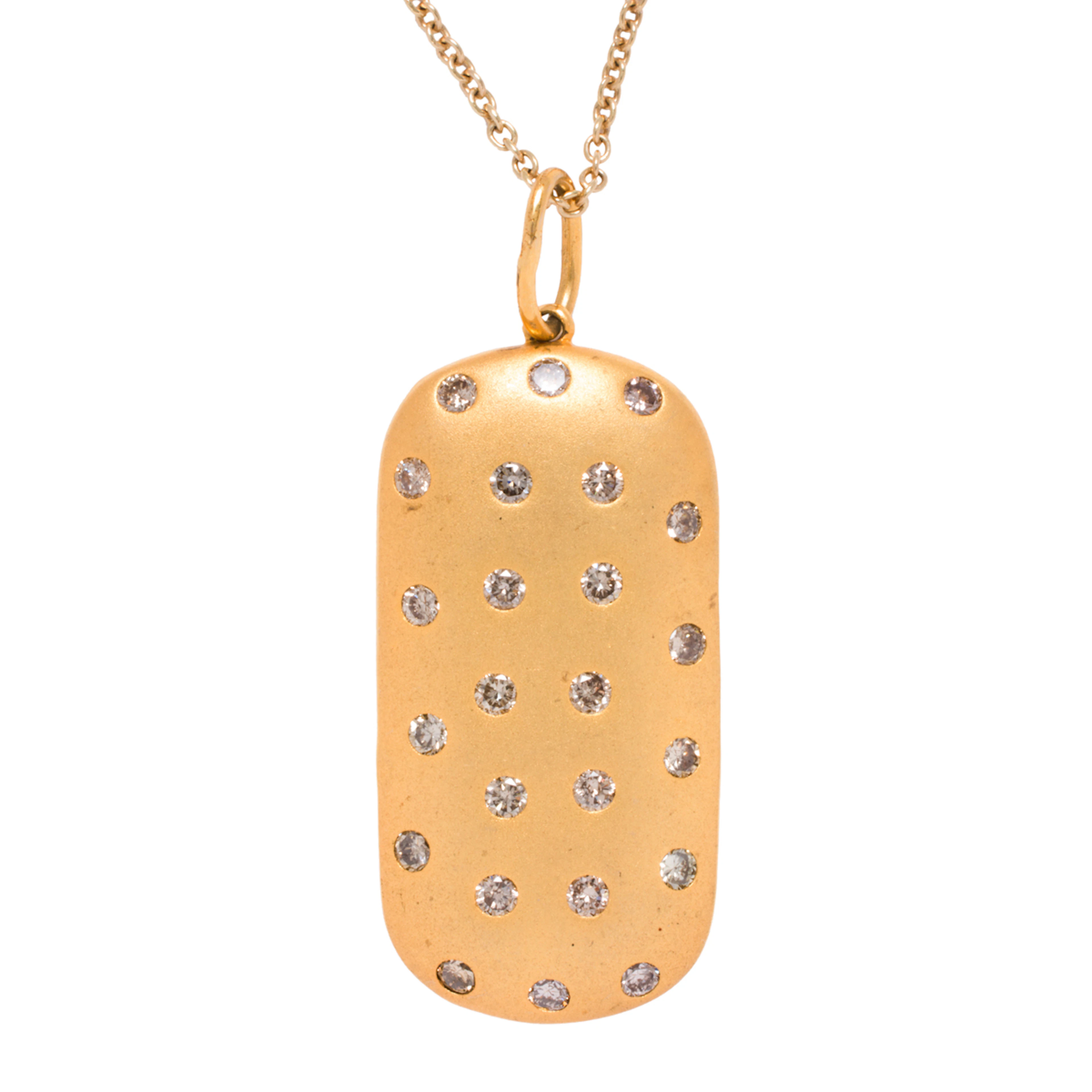 A diamond and 14k gold pendant necklace