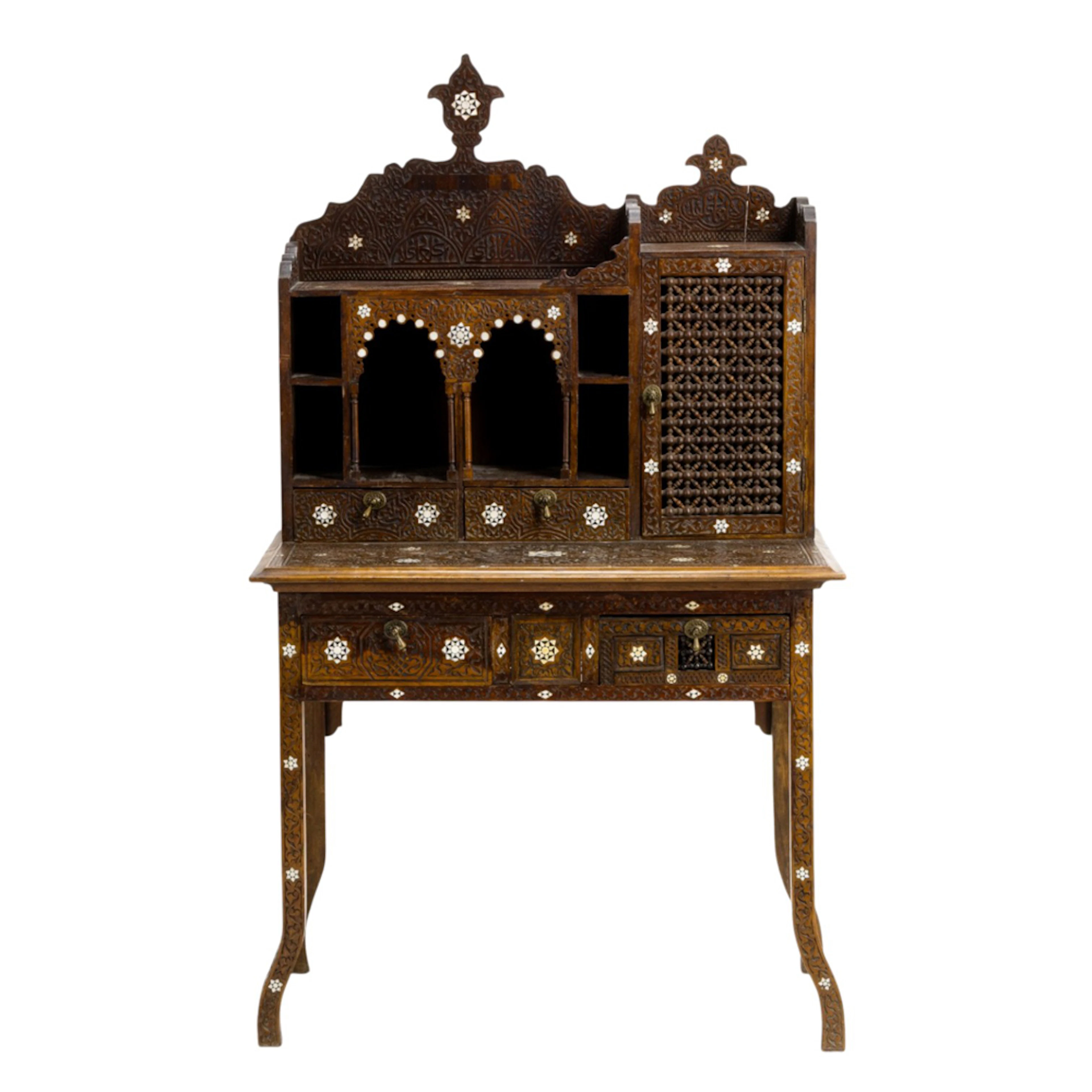 A Leventine style shell inlaid and carved secretary desk