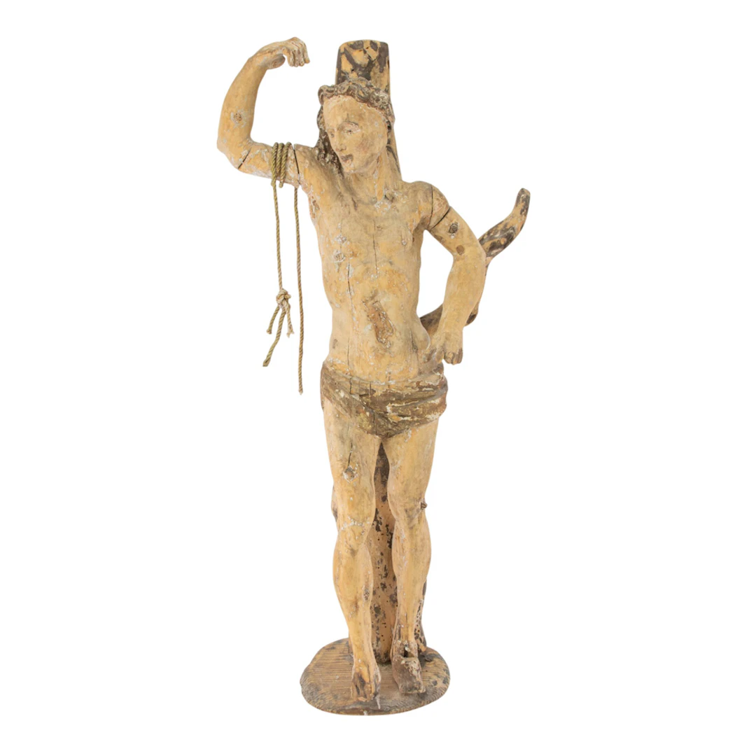 A Continental carved and polychrome figure of St. Sebastian