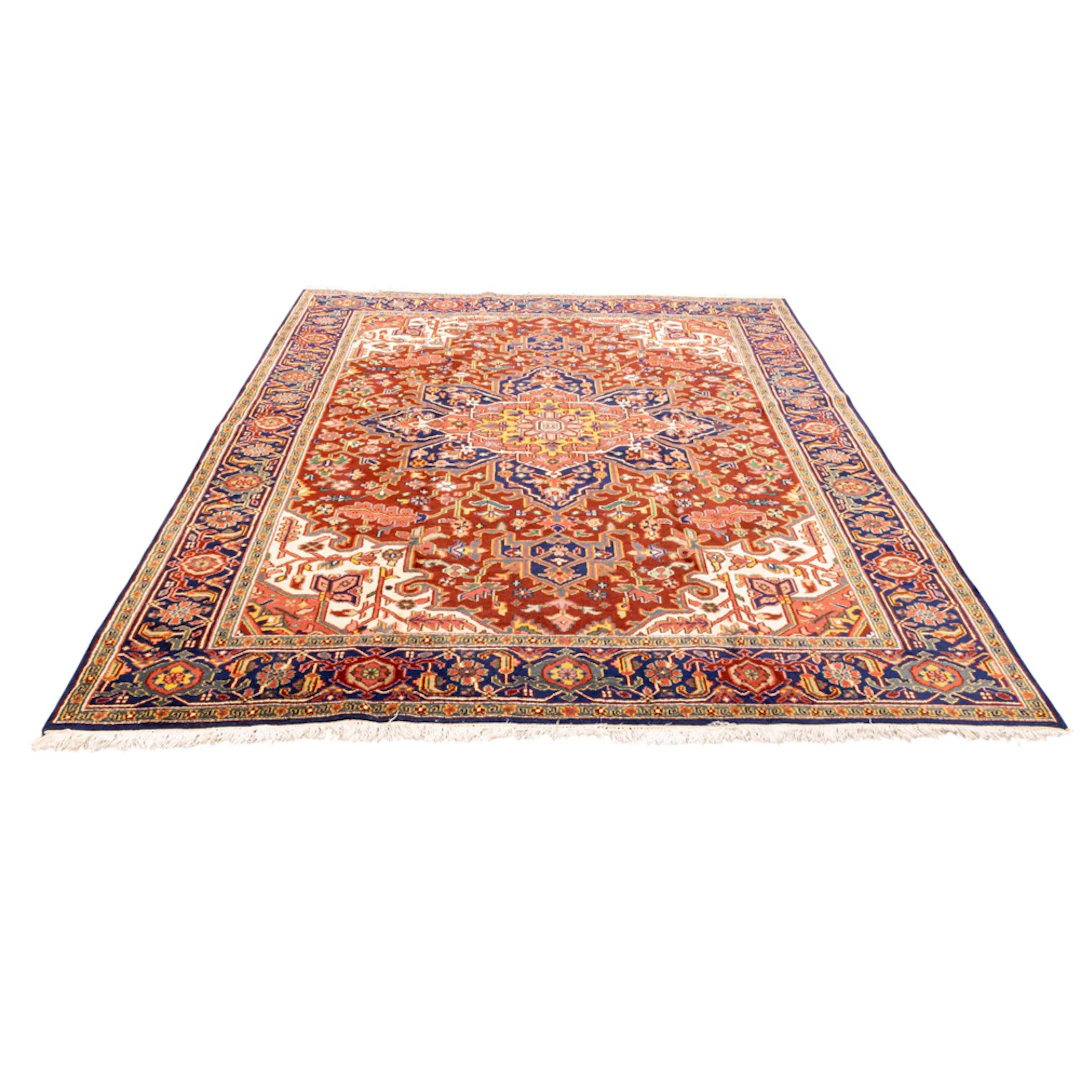 A Persian Heriz carpet