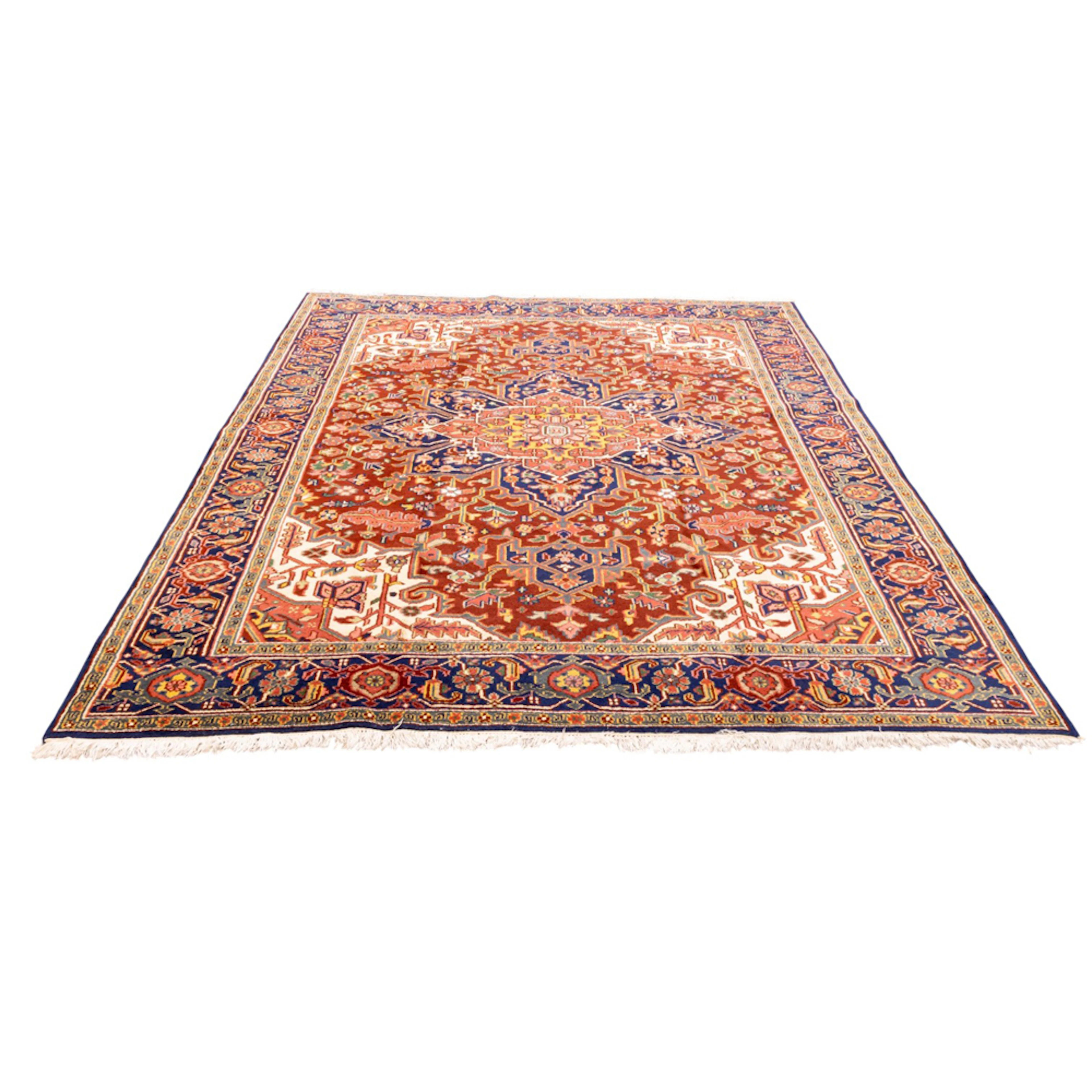 A Persian Heriz carpet