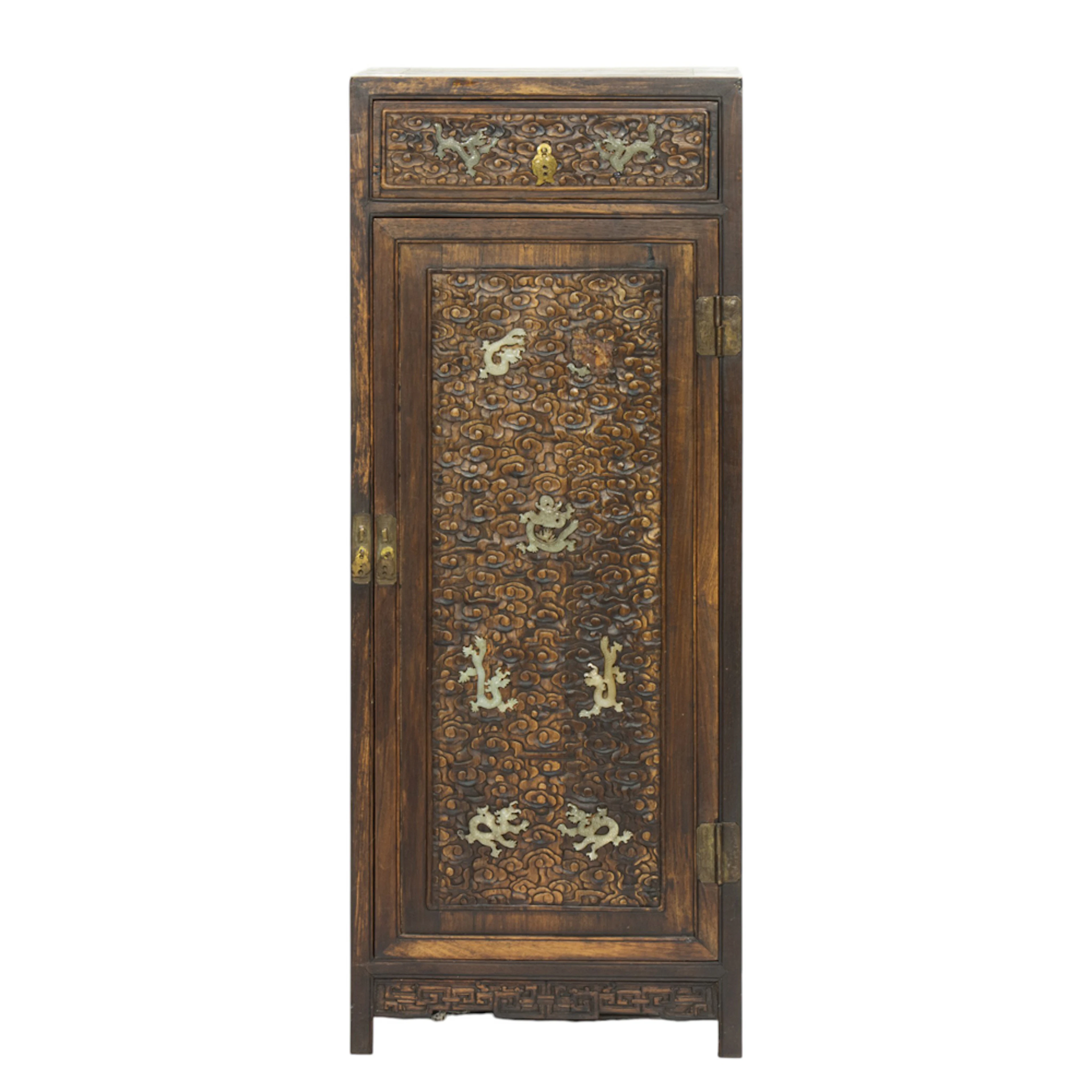 A Chinese carved rosewood cabinet