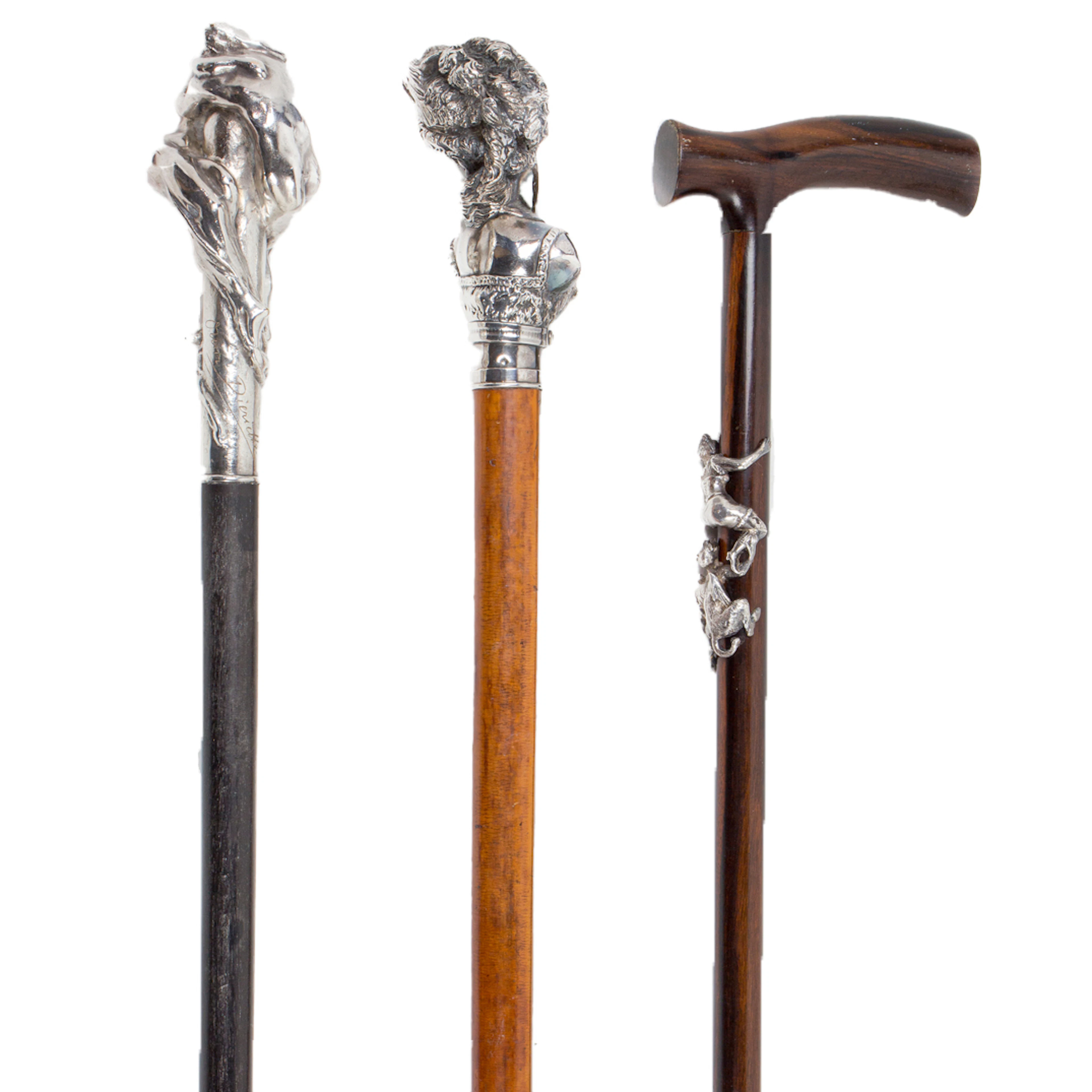 Three silver plate mounted erotic walking canes