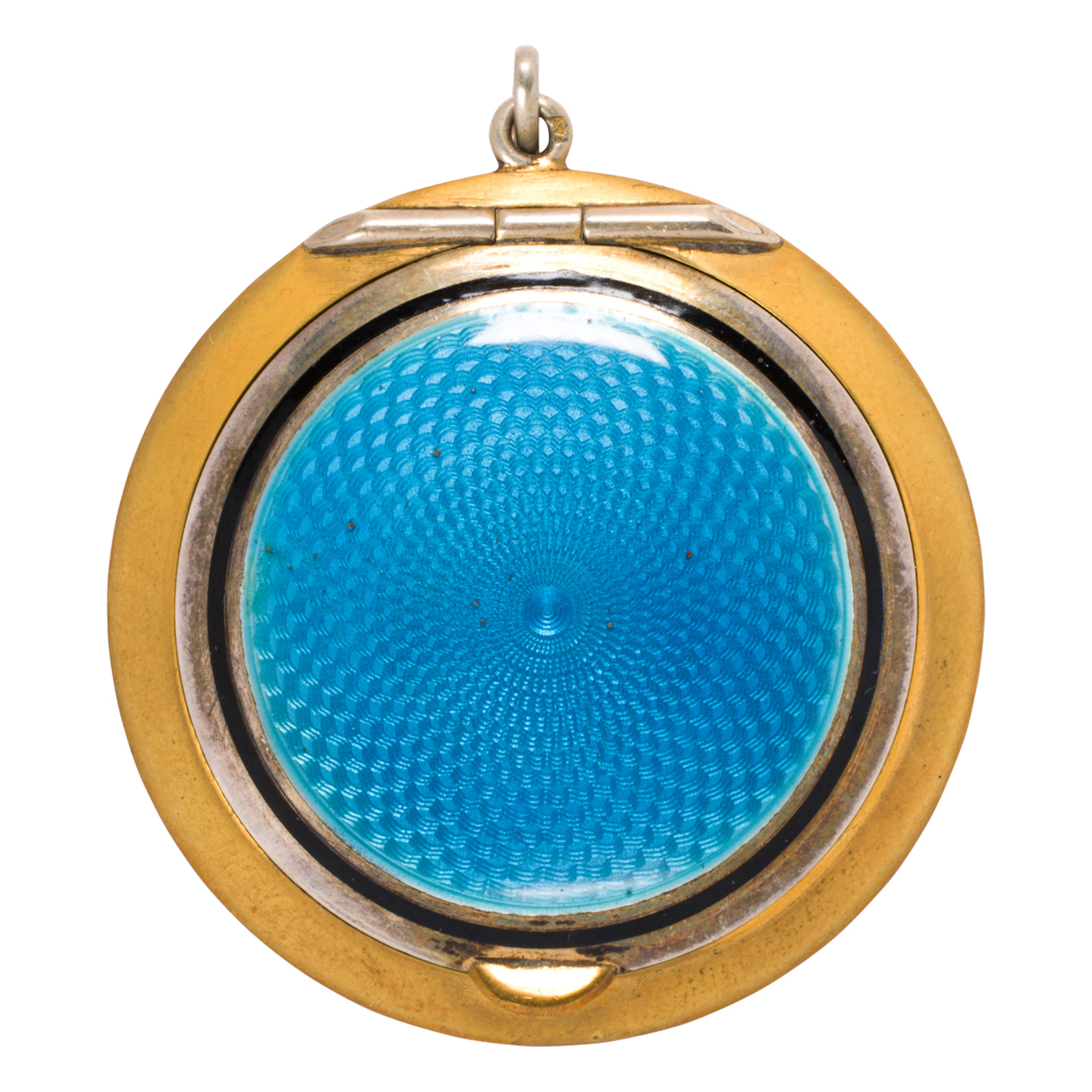 An enamel and gold-filled compact