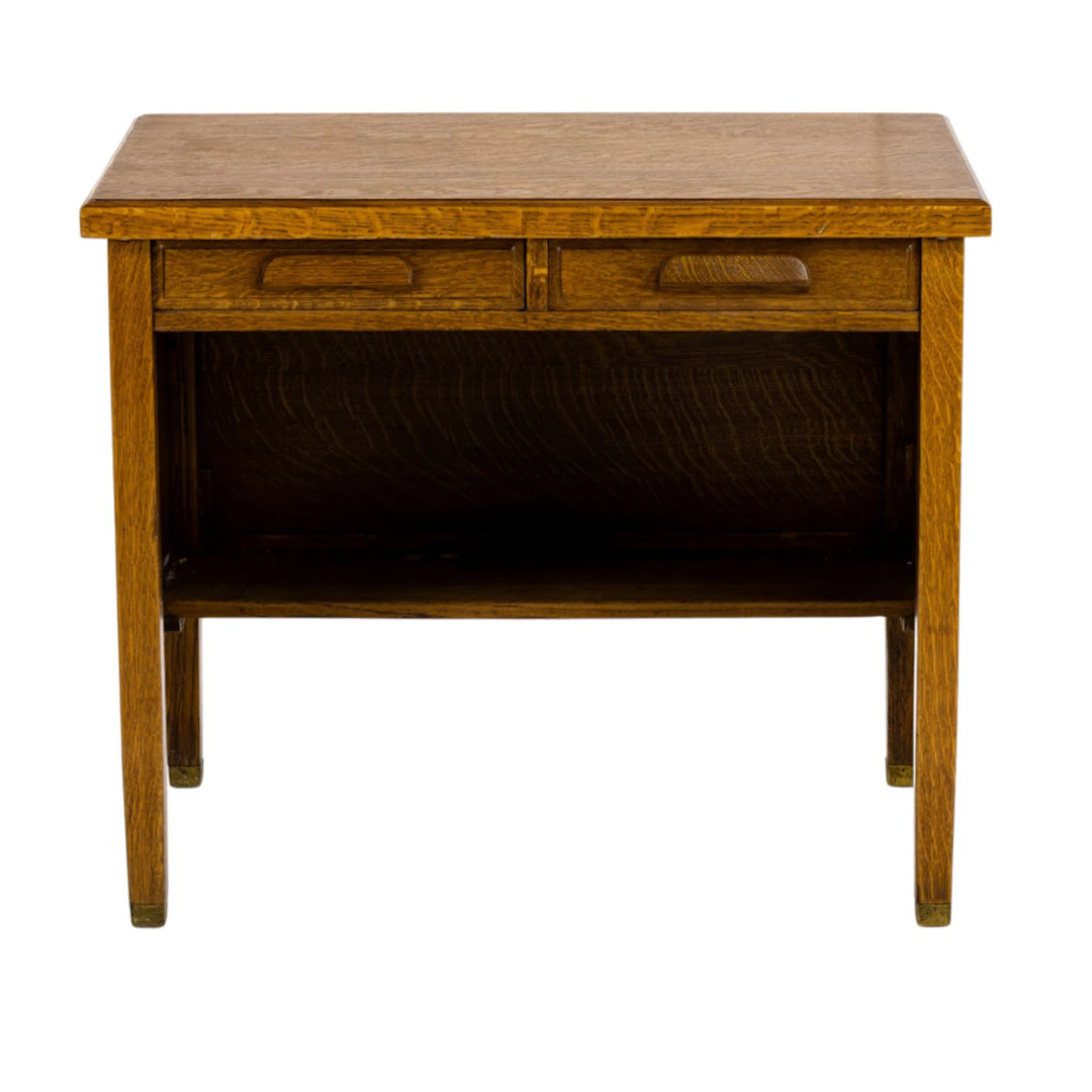 An Arts and Crafts style writing desk early 20th century