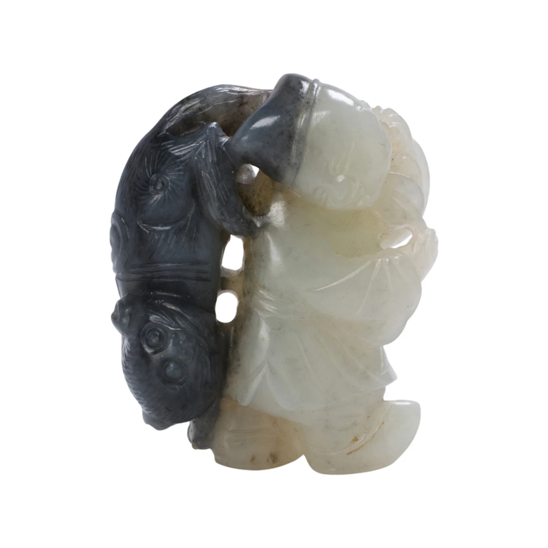 A Chinese black and white jade toggle