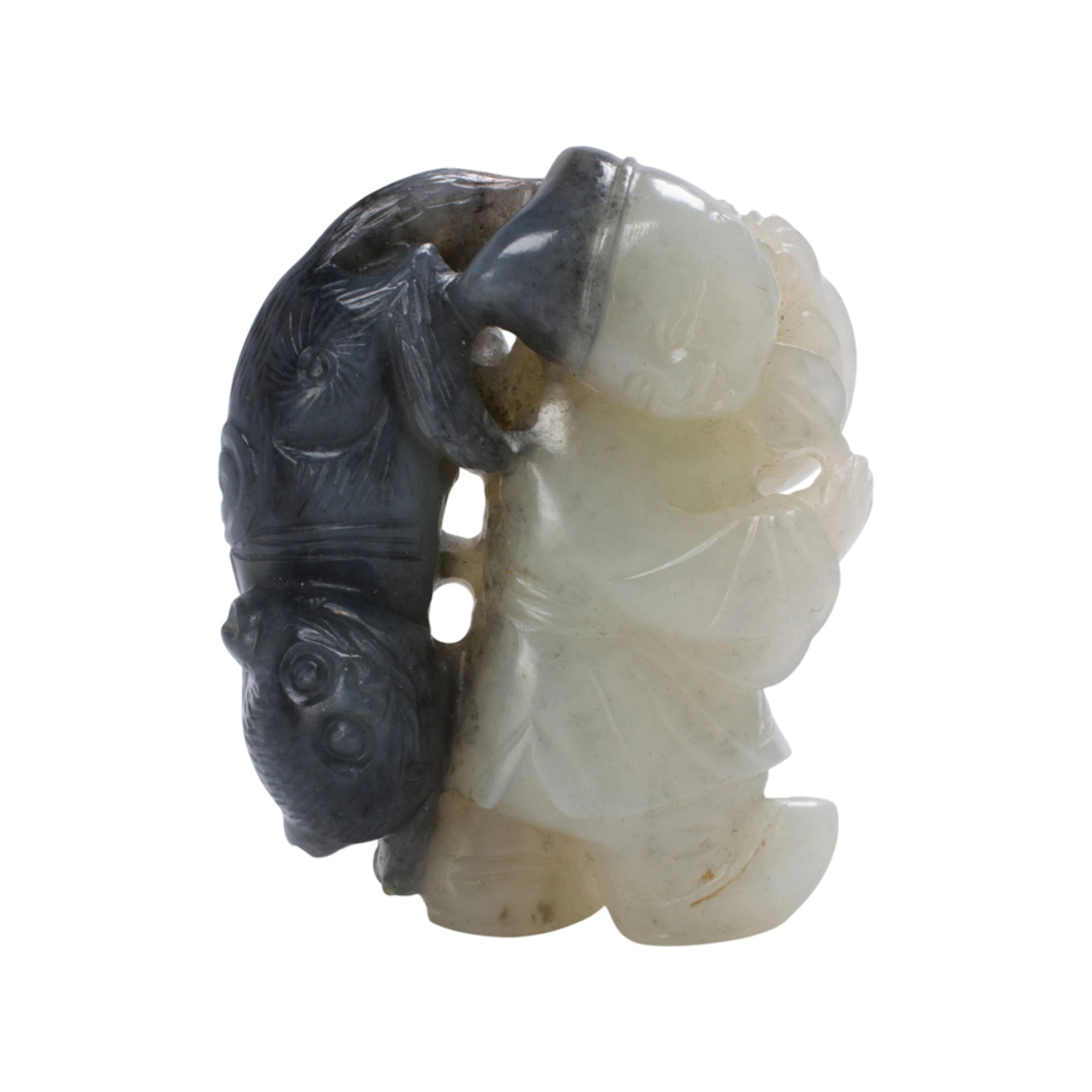 A Chinese black and white jade toggle