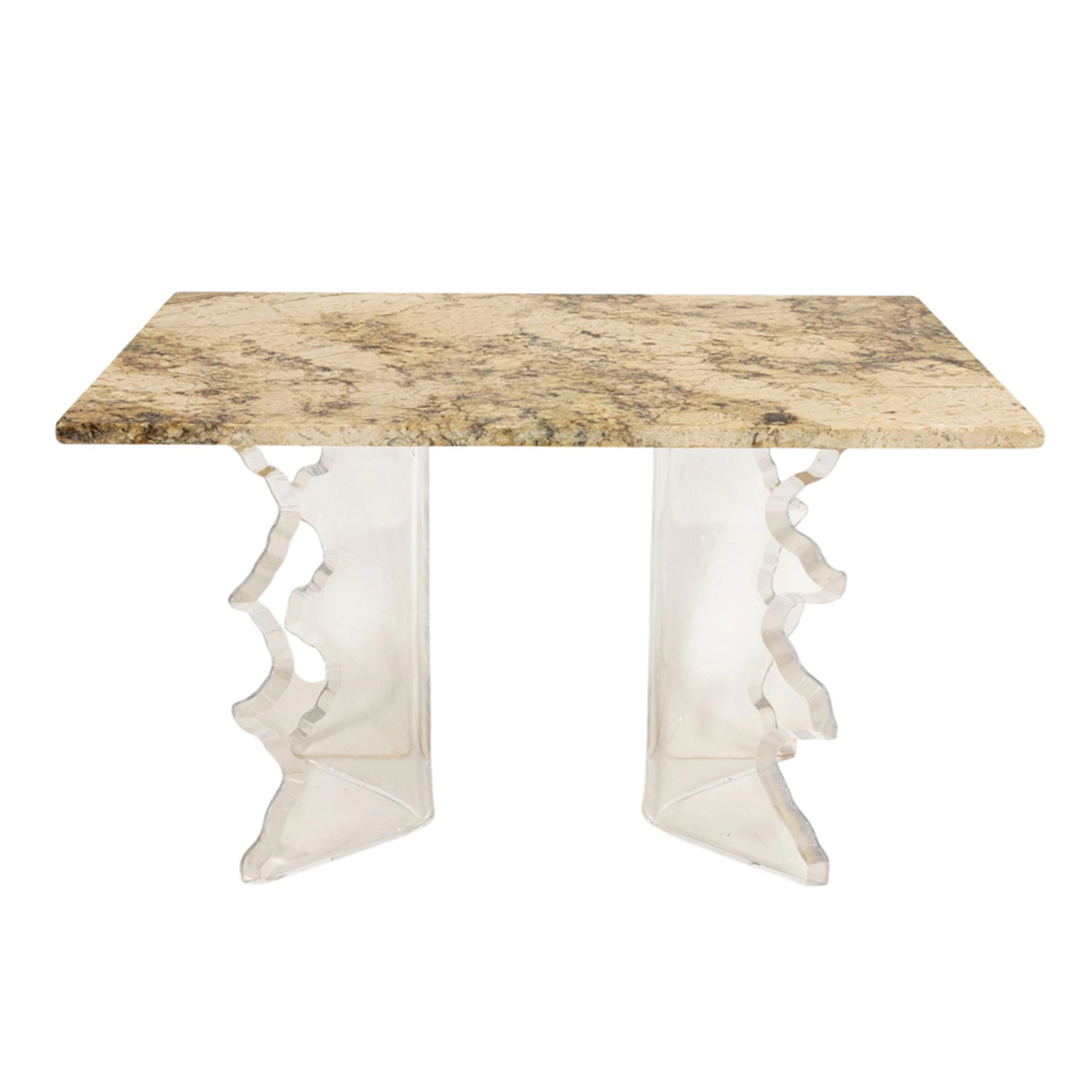 A contemporary carmel granite and acrylic cocktail or low table
