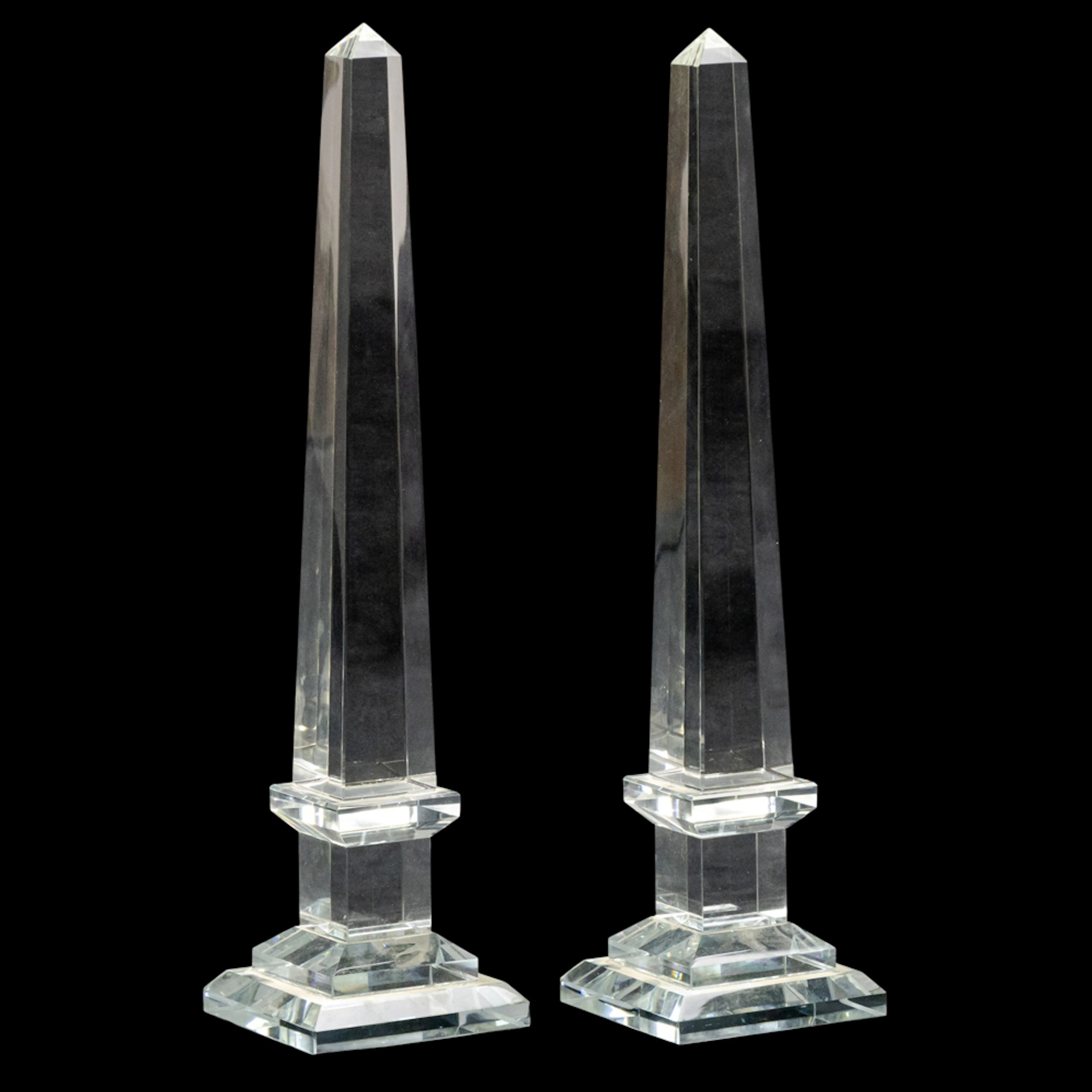 A pair of Hollywood Regency style cut glass obelisks