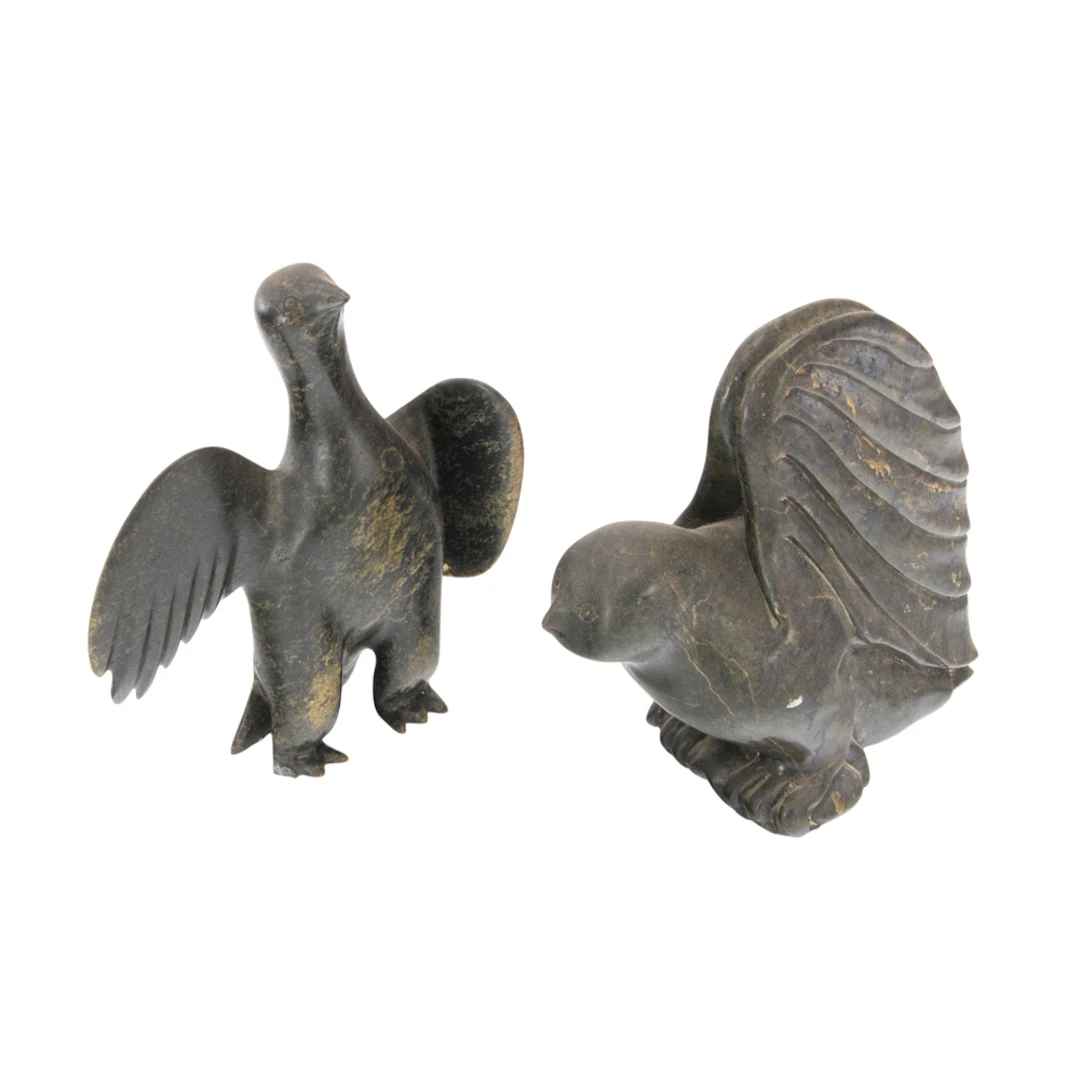 Two Inuit carved serpentine birds