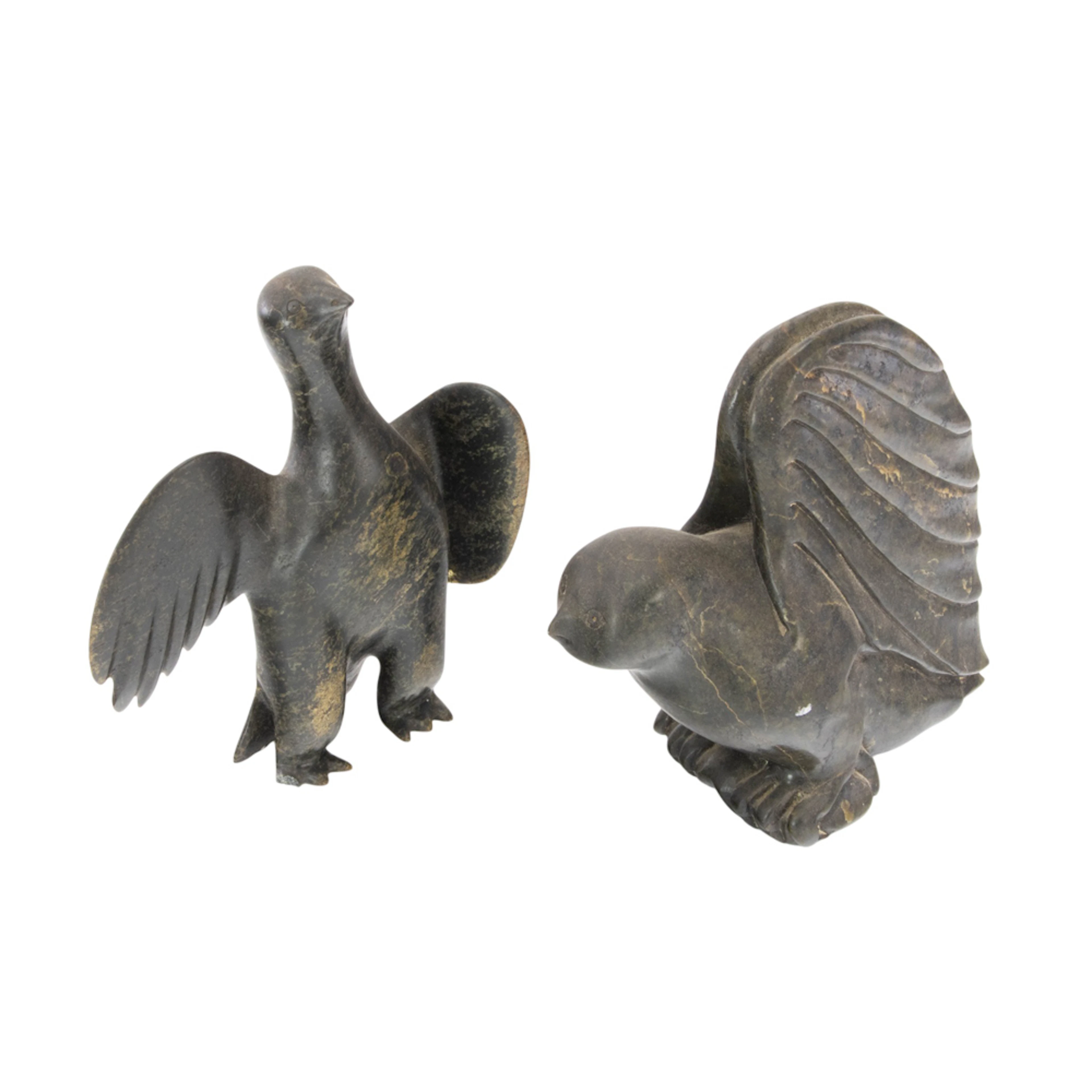 Two Inuit carved serpentine birds