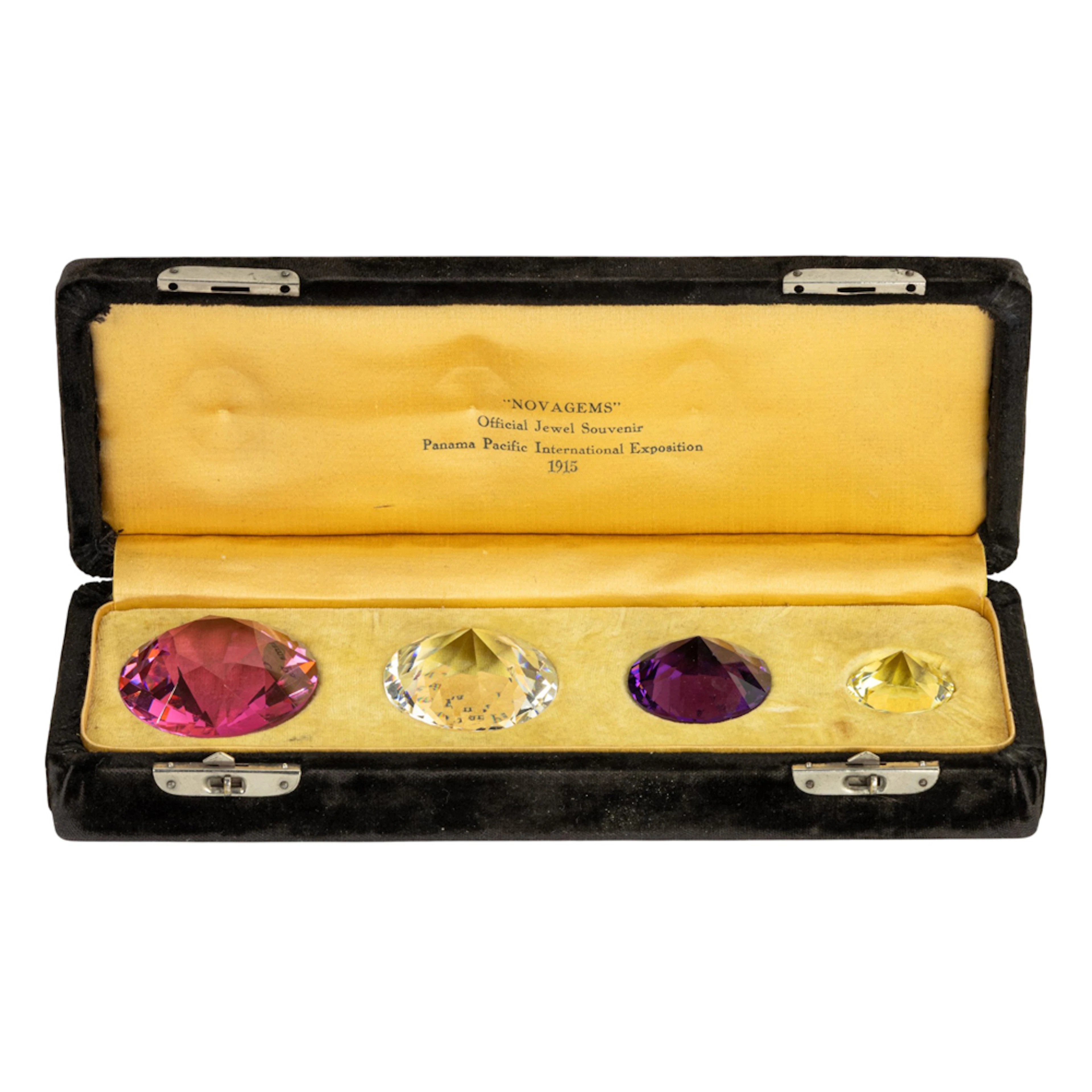 A cased presentation box of fitted Novagems in box presented to Mr.