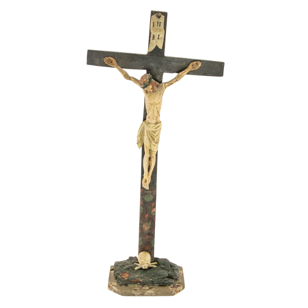 A German carved and polychrome crucifix