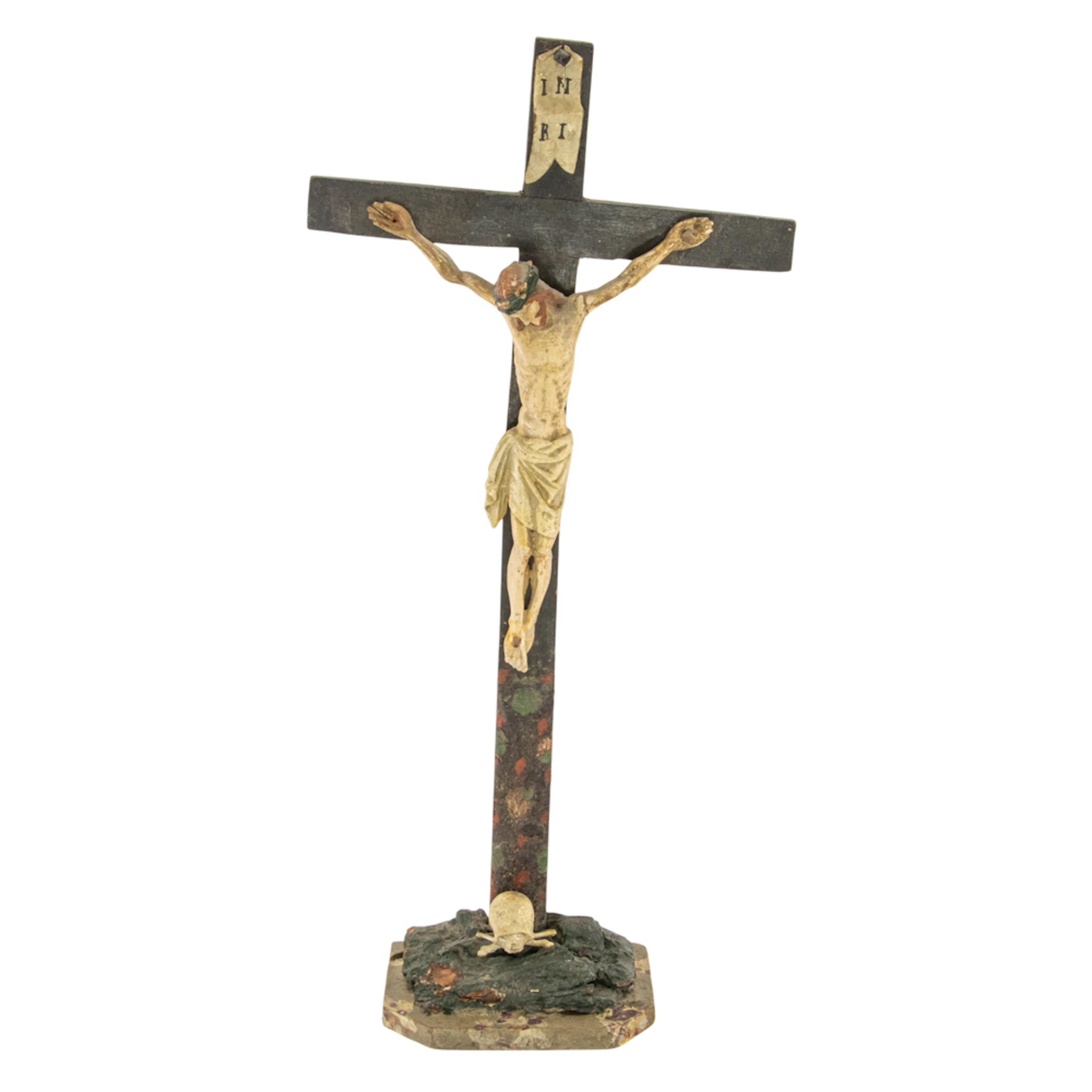 A German carved and polychrome crucifix