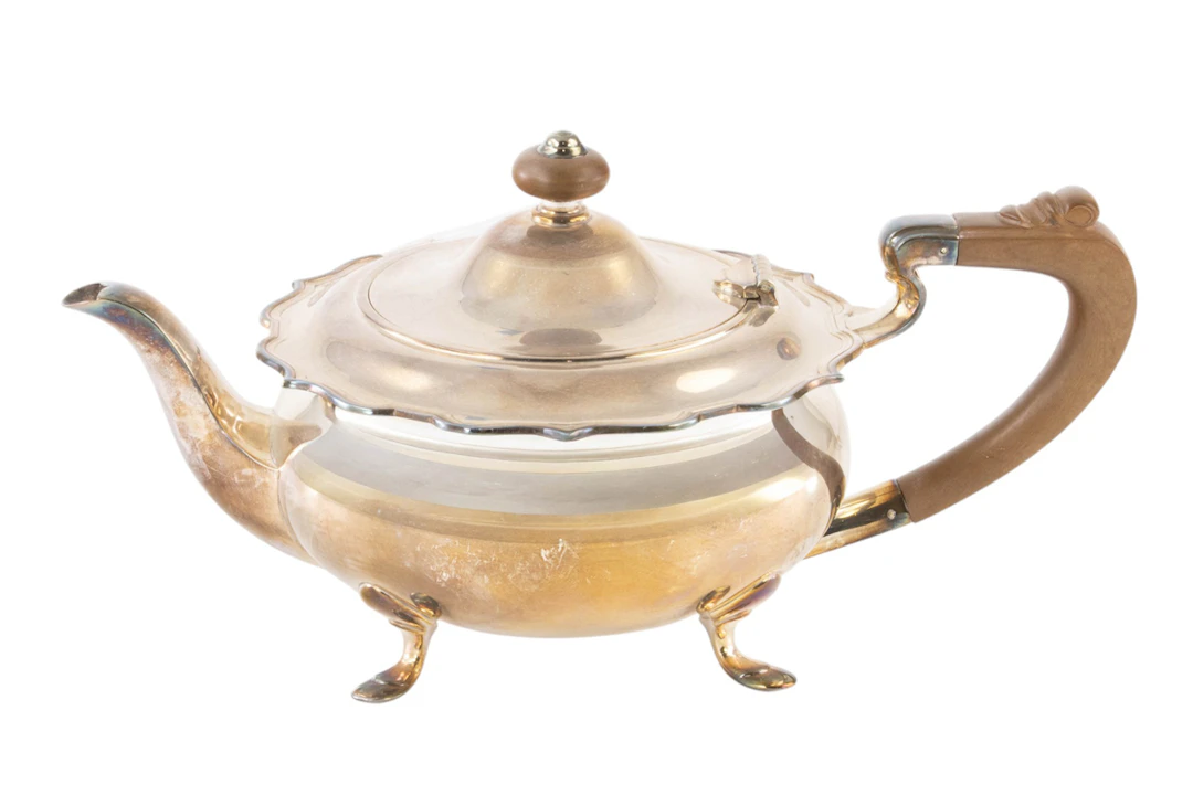 A George VI silver footed teapot