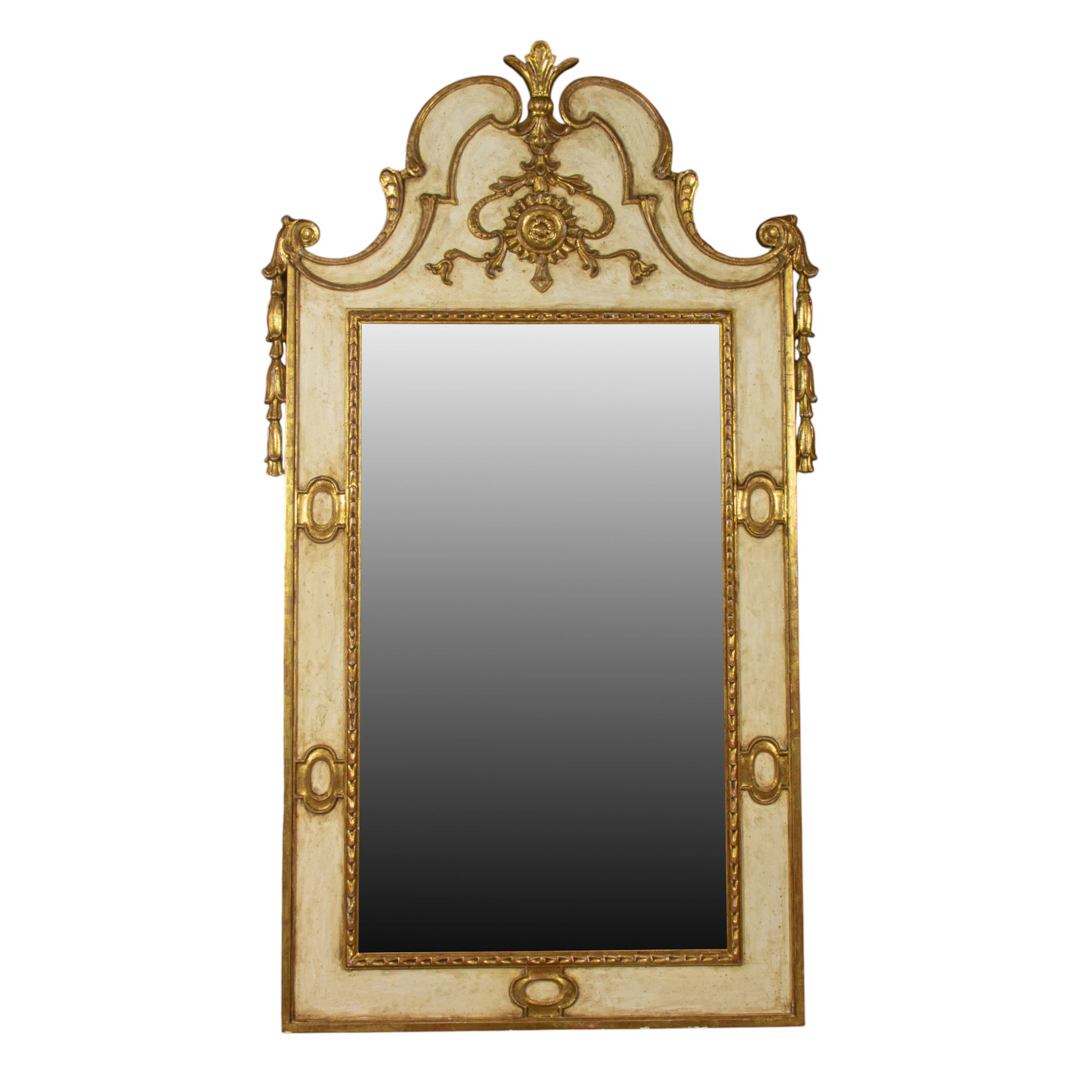 An Italian parcel gilt and polychrome decorated mirror