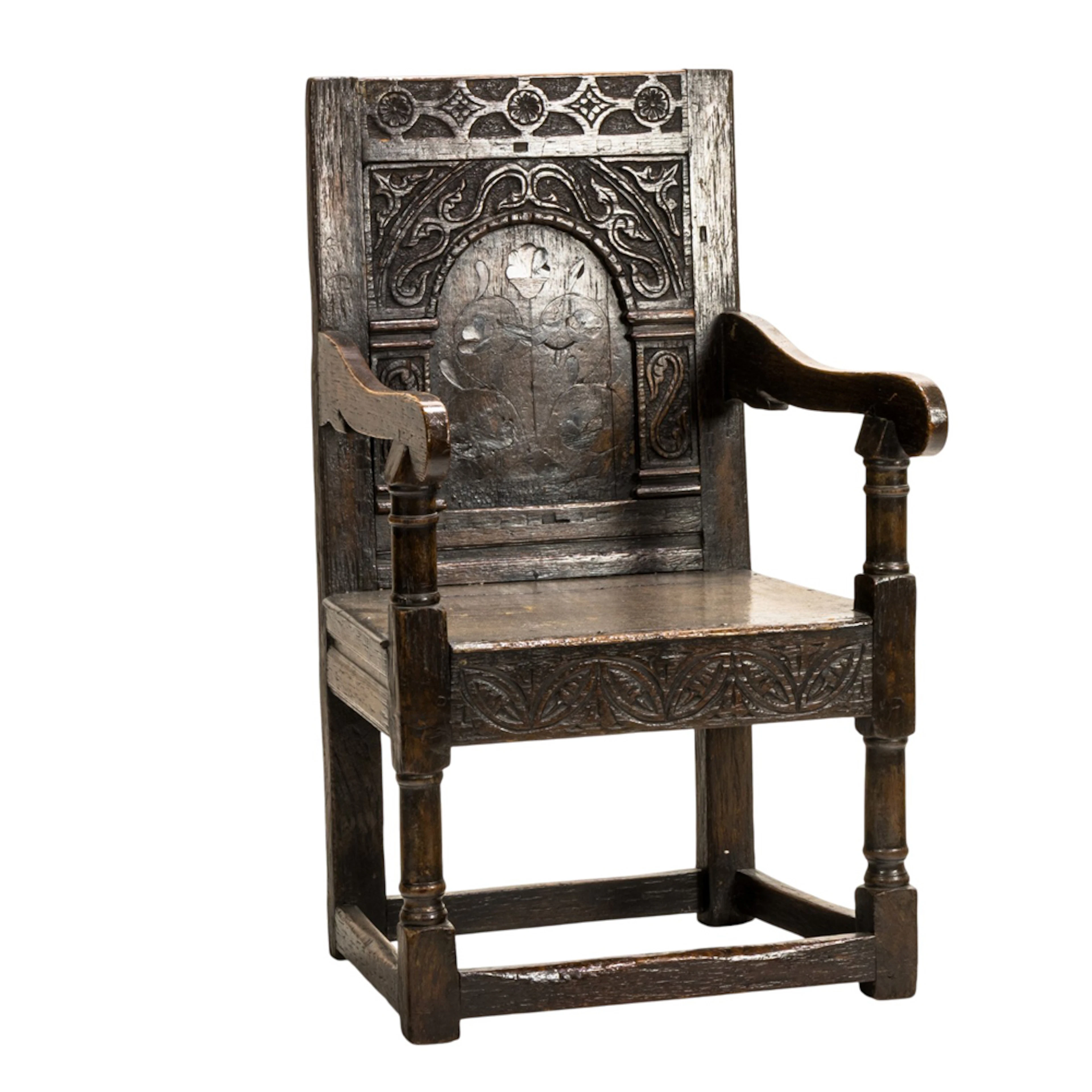 An English Charles I carved and inlaid wainscot chair