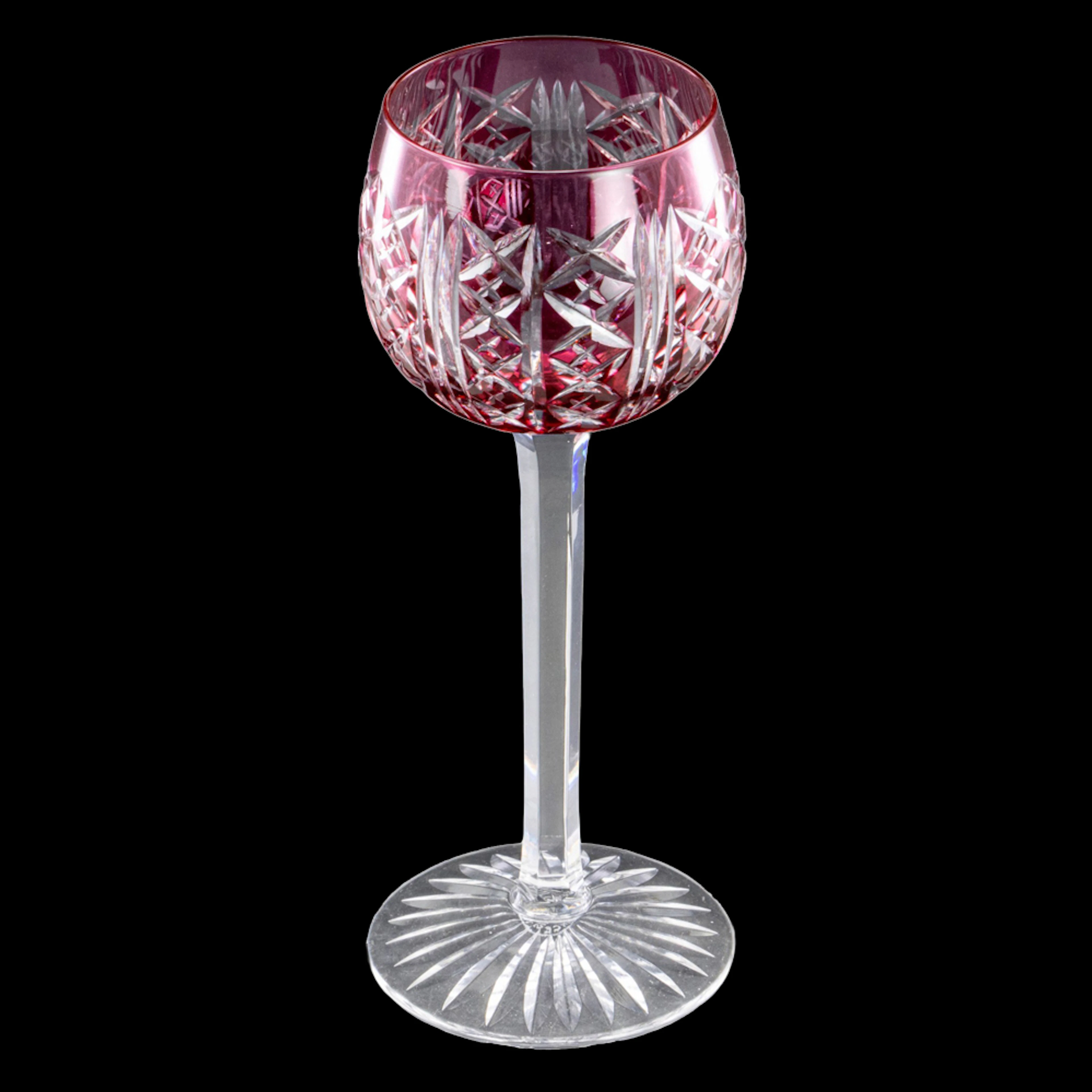 A set of sixteen St. Louis cranberry flashed cut to clear glass Roemer