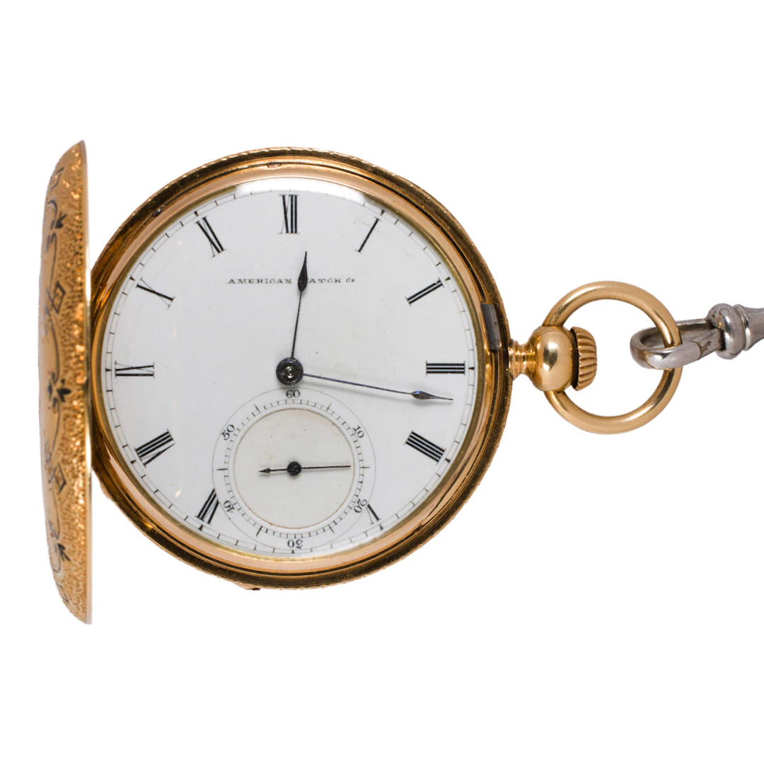 A custom PJ Bartlett 18k gold pocket watch and accessories