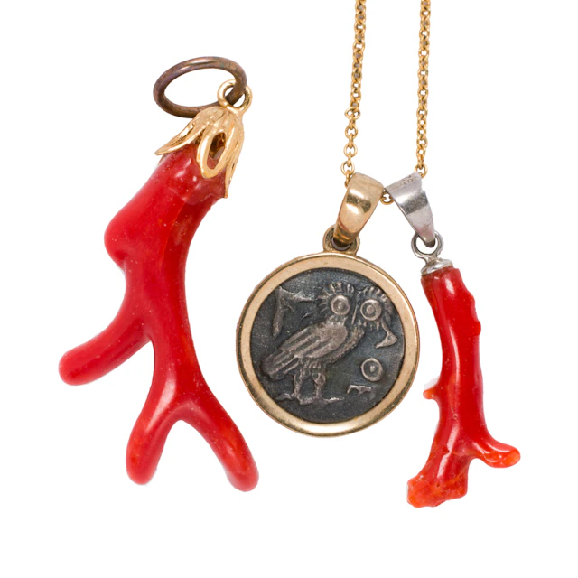 A coral, 14k gold, and gold-filled pendant and pendant necklace