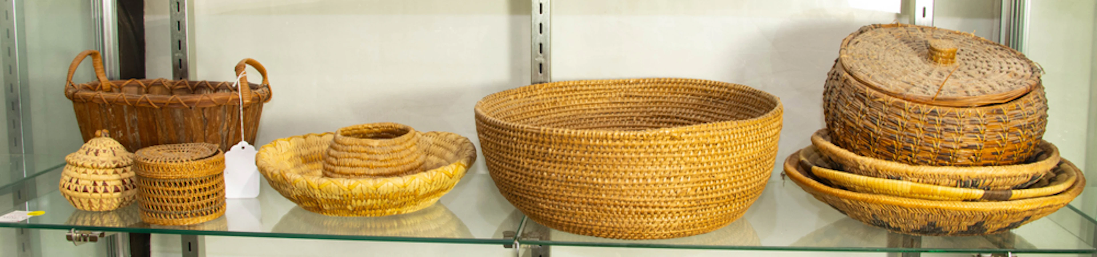 A group of Native American and Arts and Crafts baskets