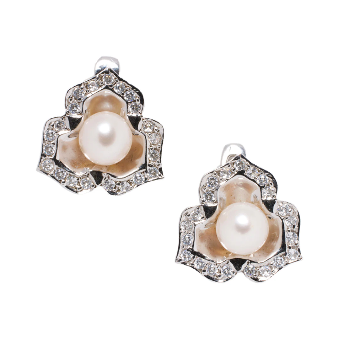 A pair of pearl and 14k gold earrings