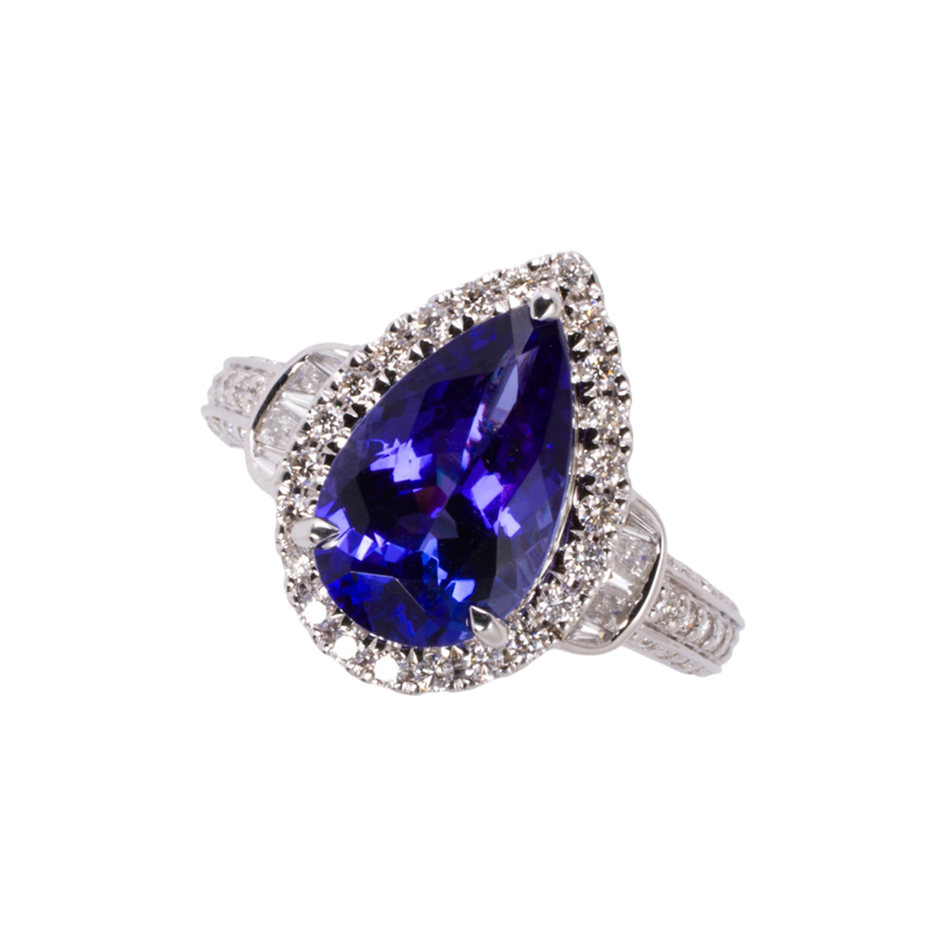 A tanzanite, diamond, and 14k white gold ring