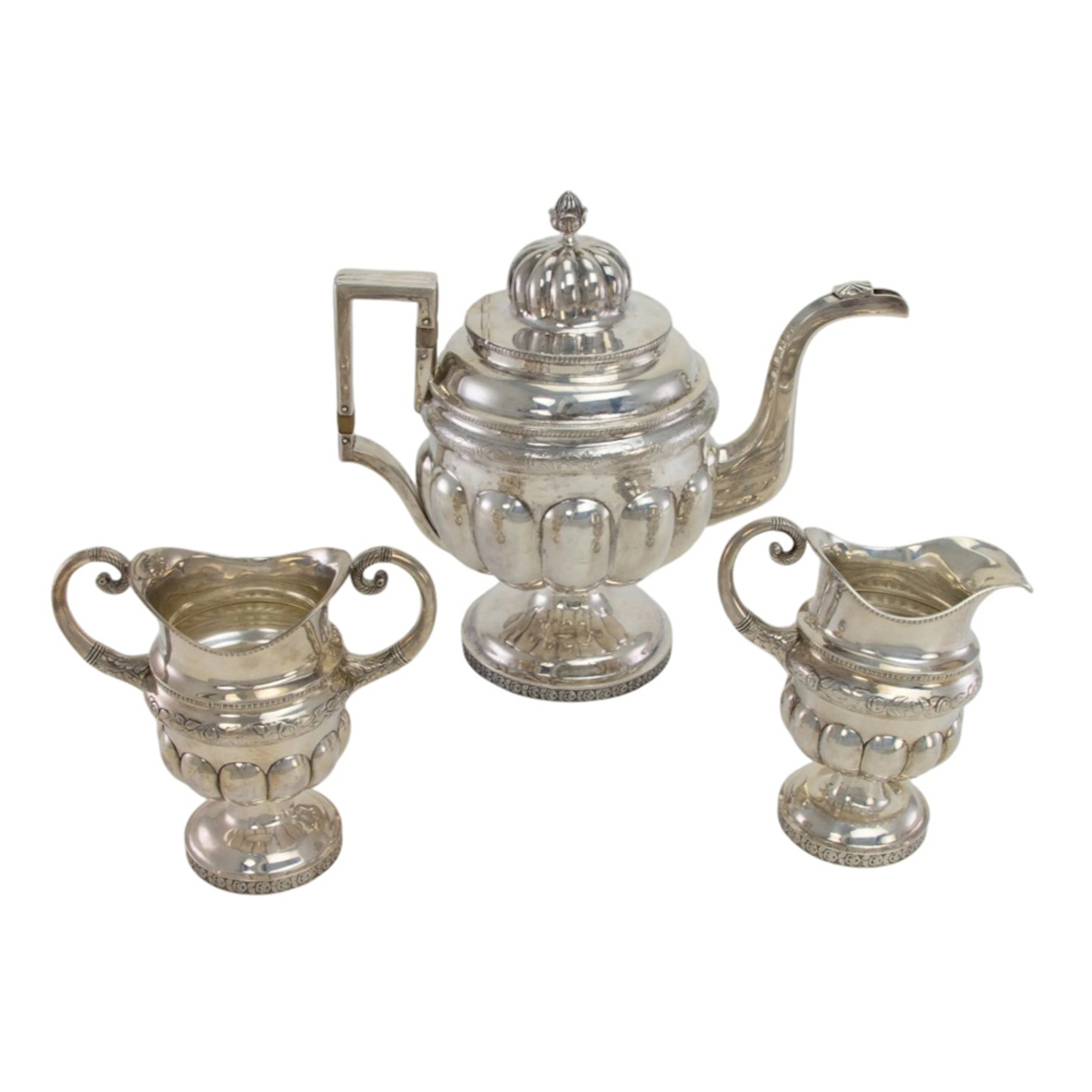 An American Federal silver teapot with later matching sterling cream