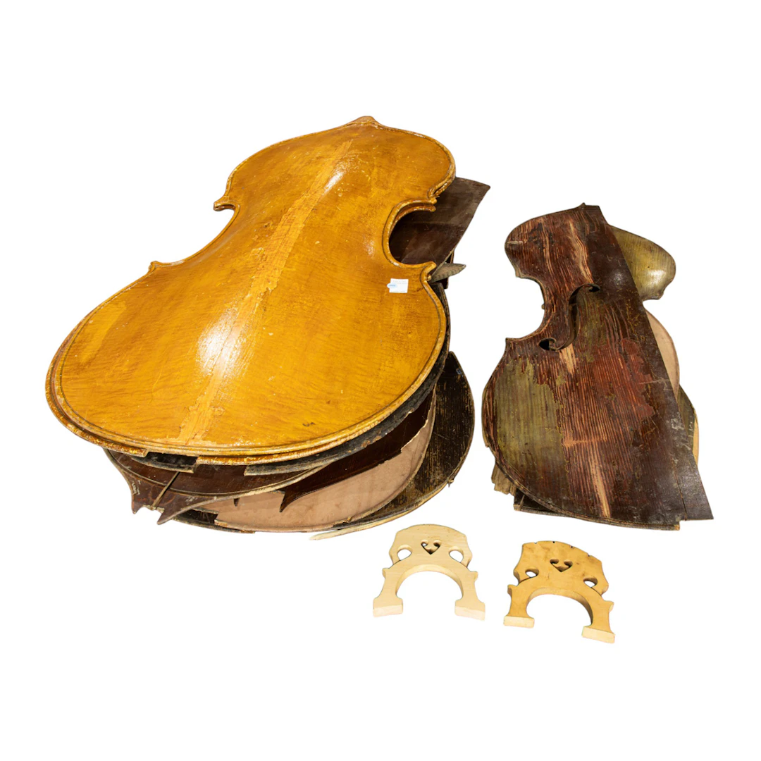 An assembled group of double bass parts
