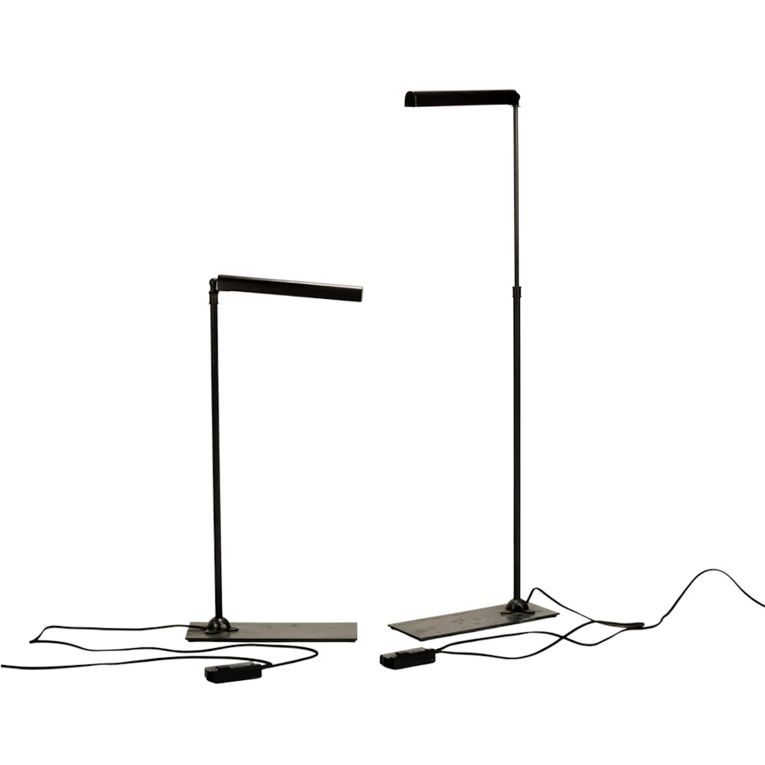 A pair of Restoration Hardware slimline task floor lamps