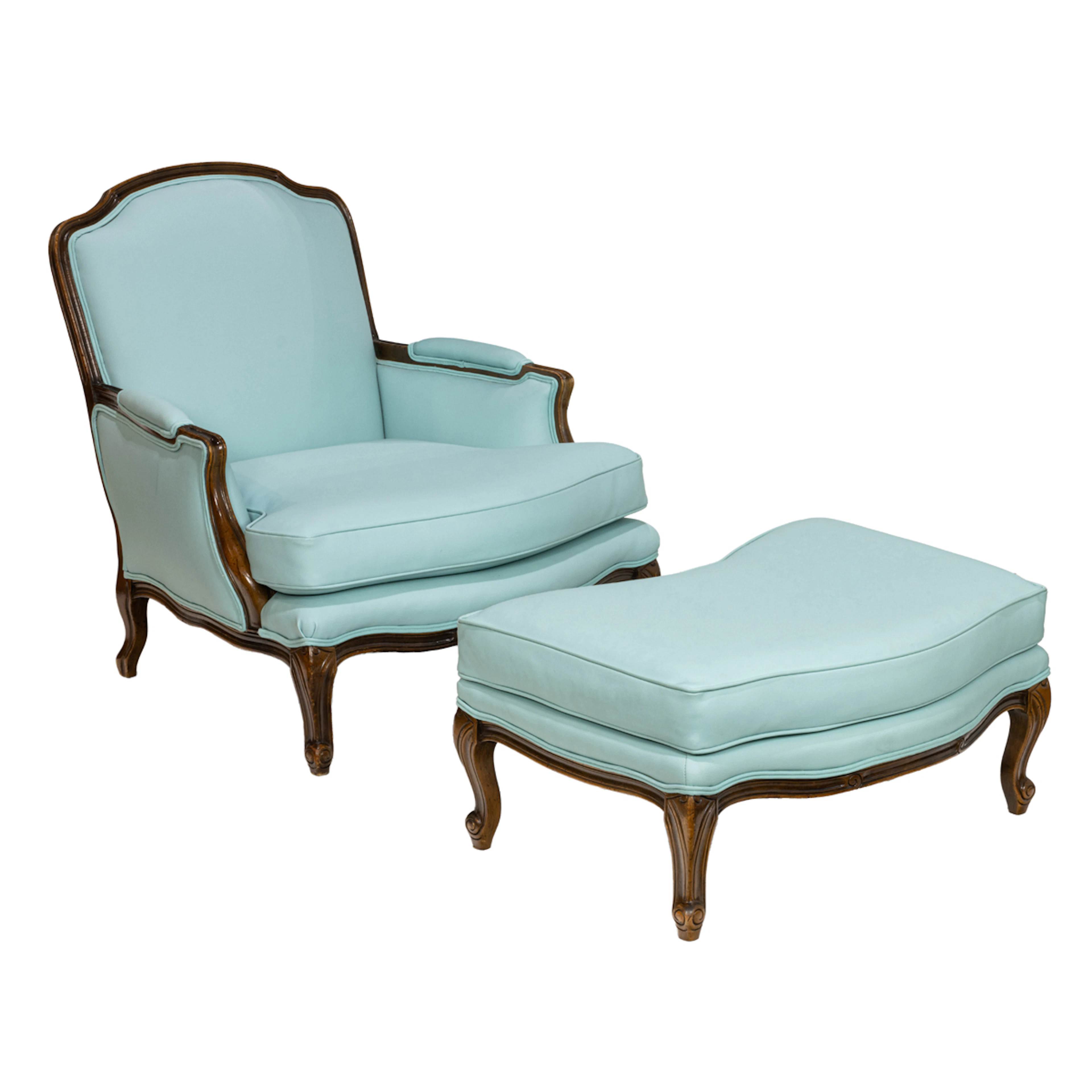A large Louis XV style bergere and ottoman in "Tiffany" pale blue leather